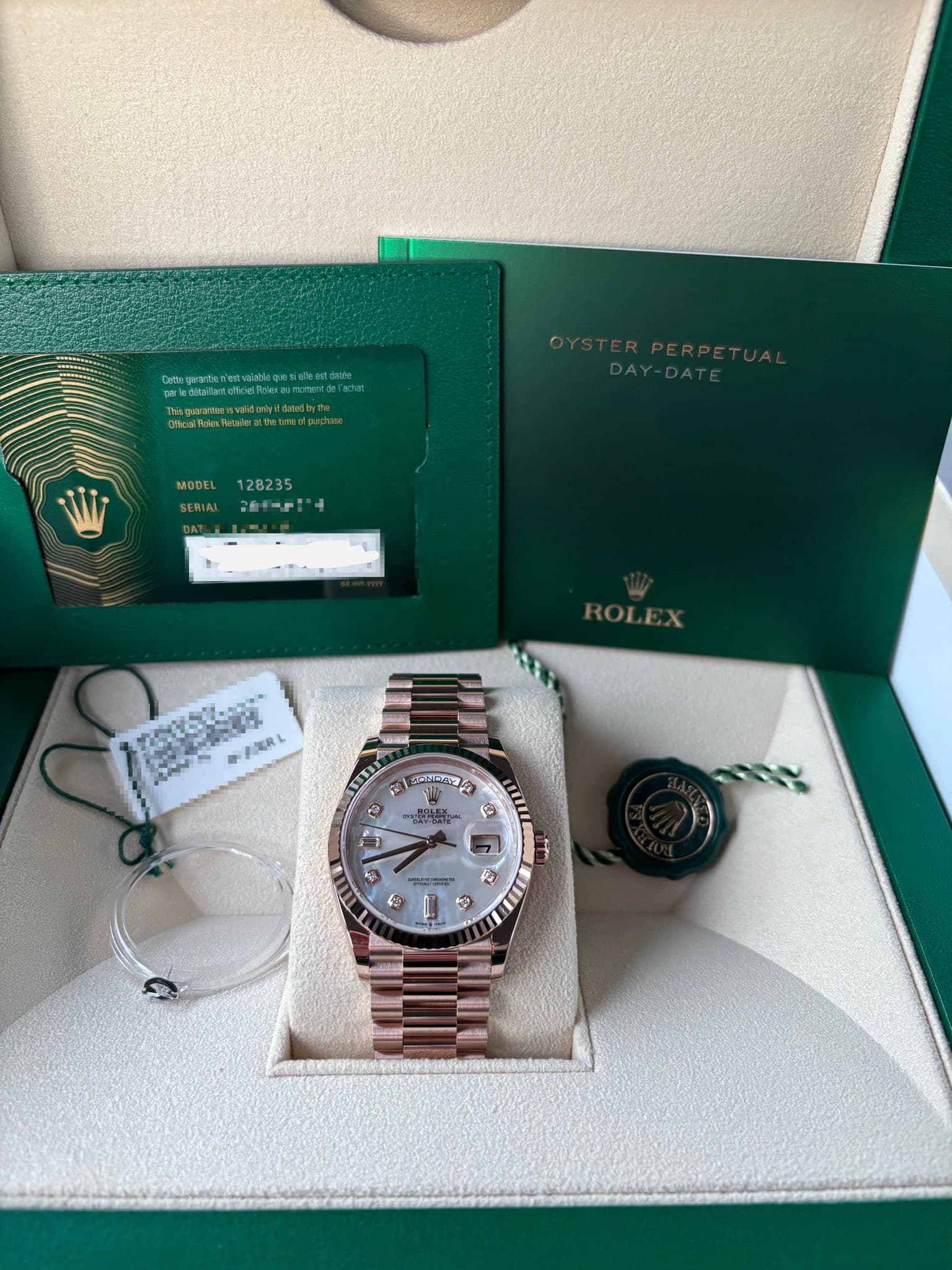 May be an image of wrist watch and text