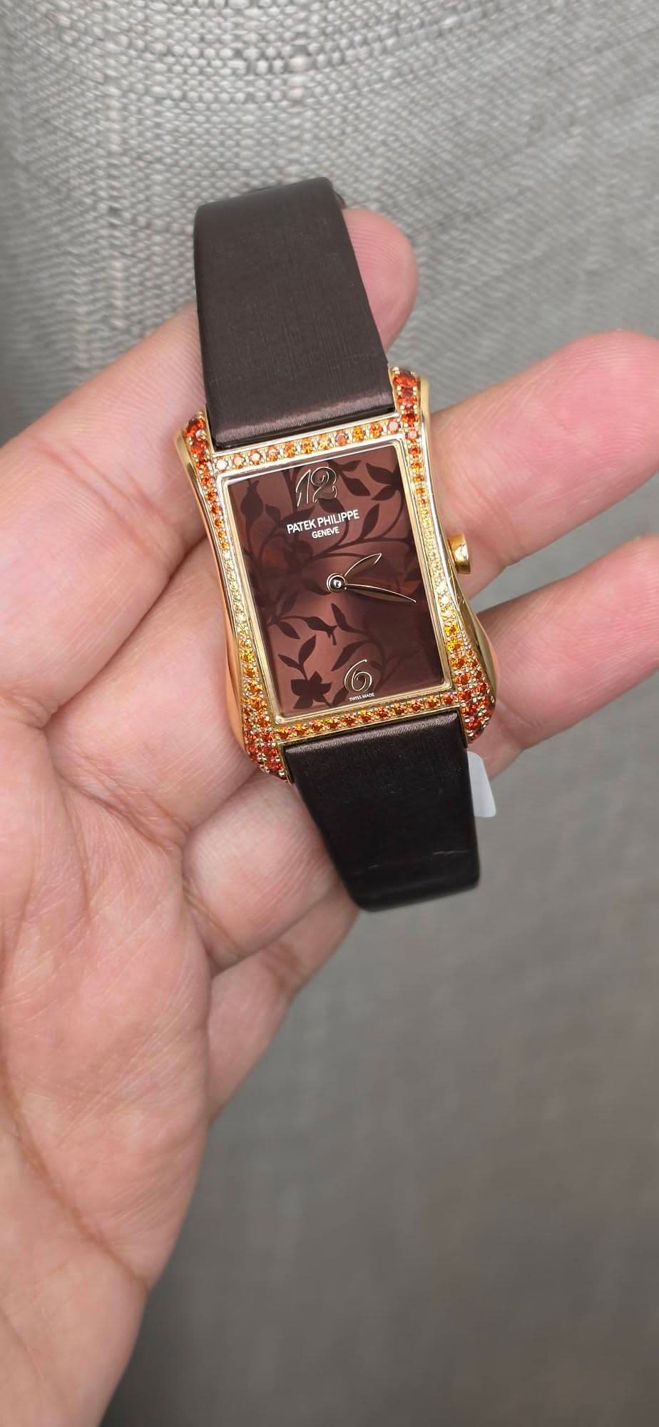 May be an image of digital watch and text