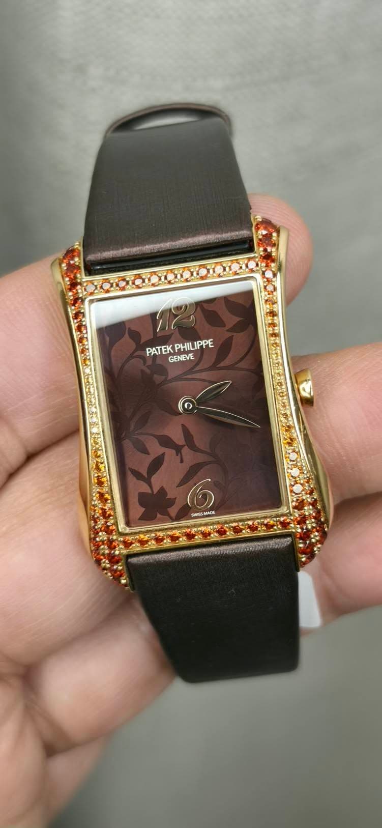 May be an image of wrist watch