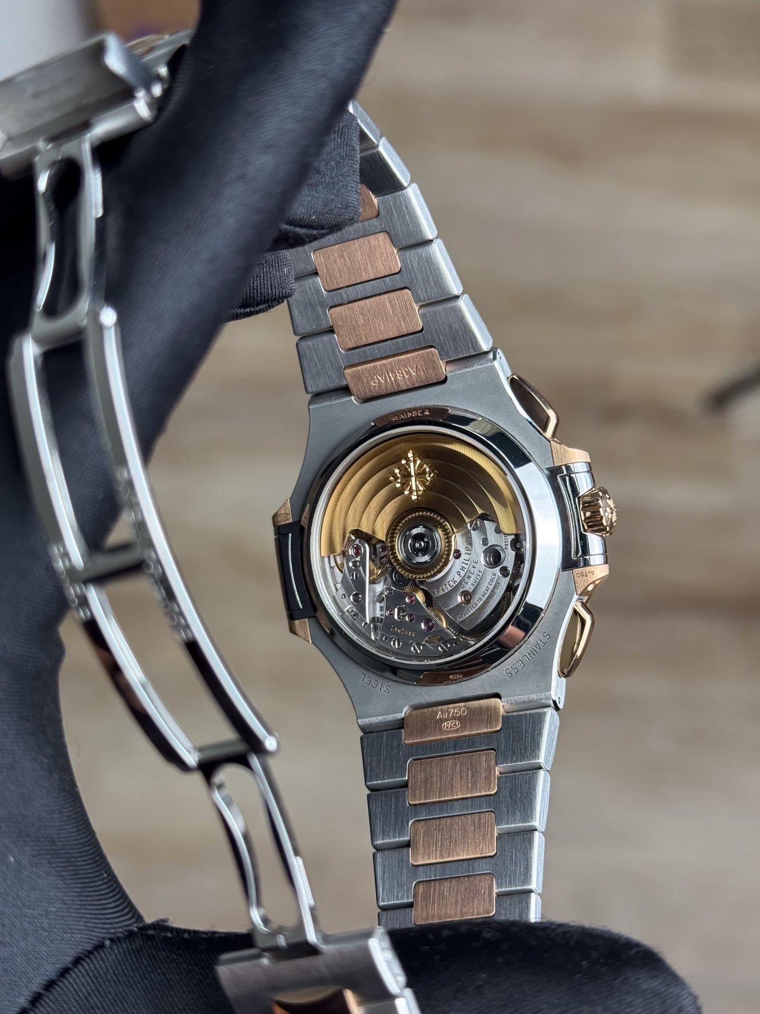 May be an image of wrist watch and text