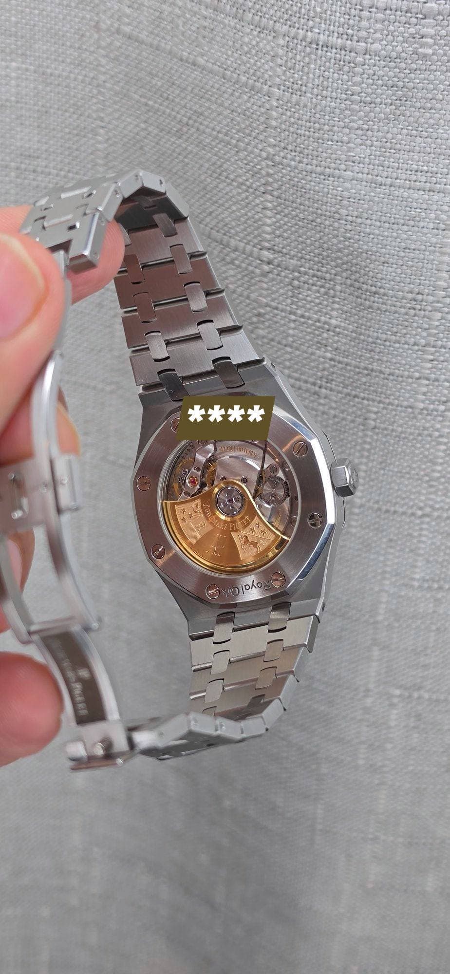 May be an image of digital watch and text