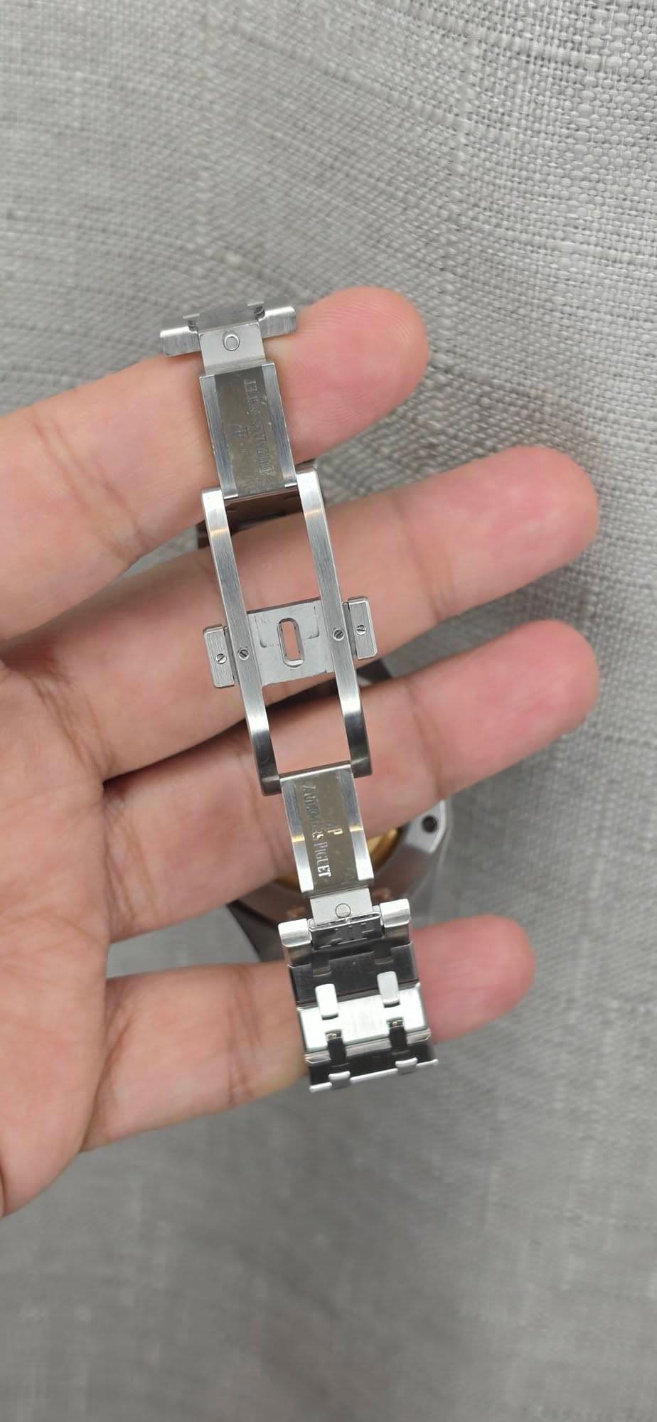 May be an image of jewelry and wrist watch