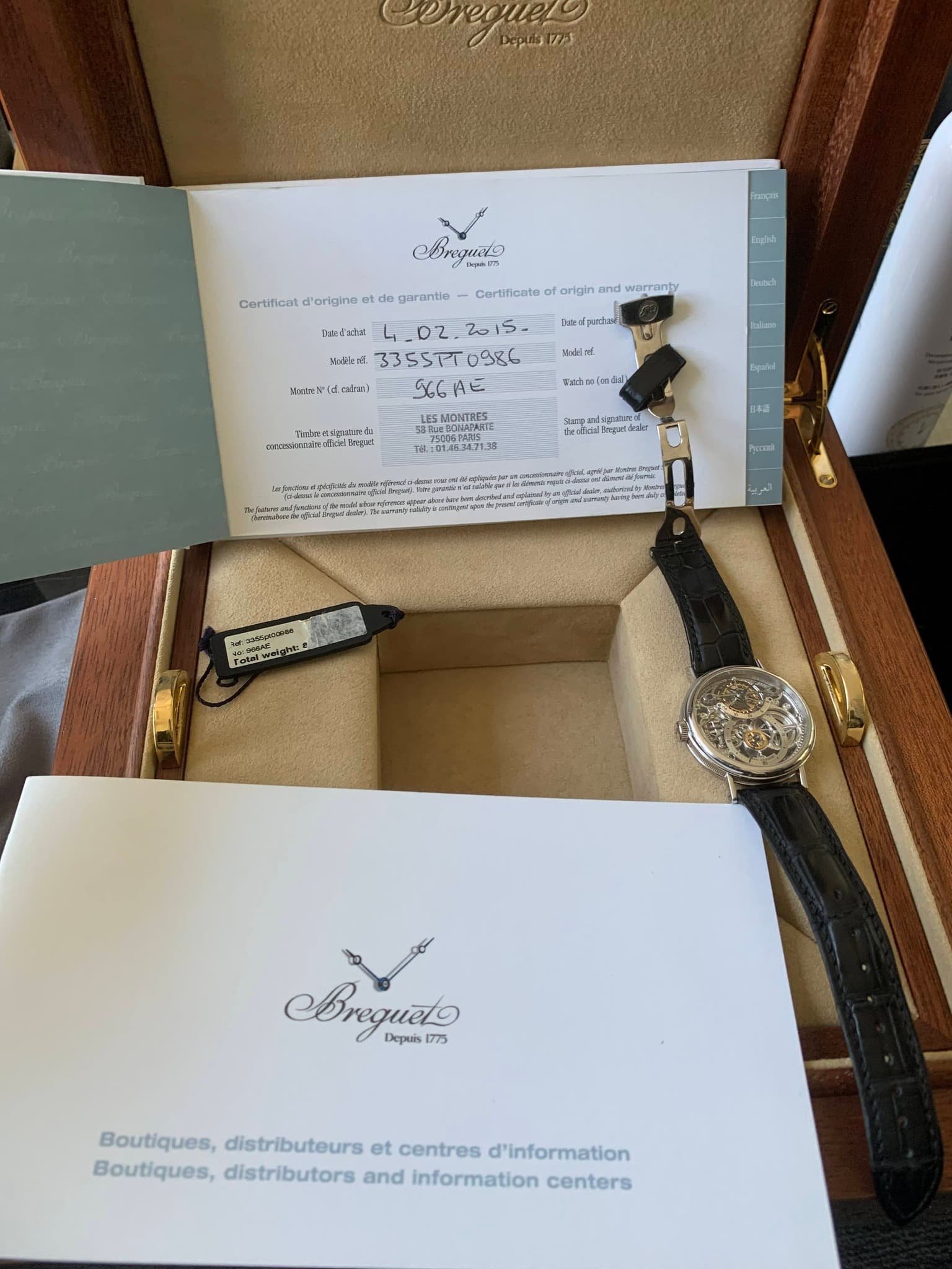 May be an image of wrist watch and text