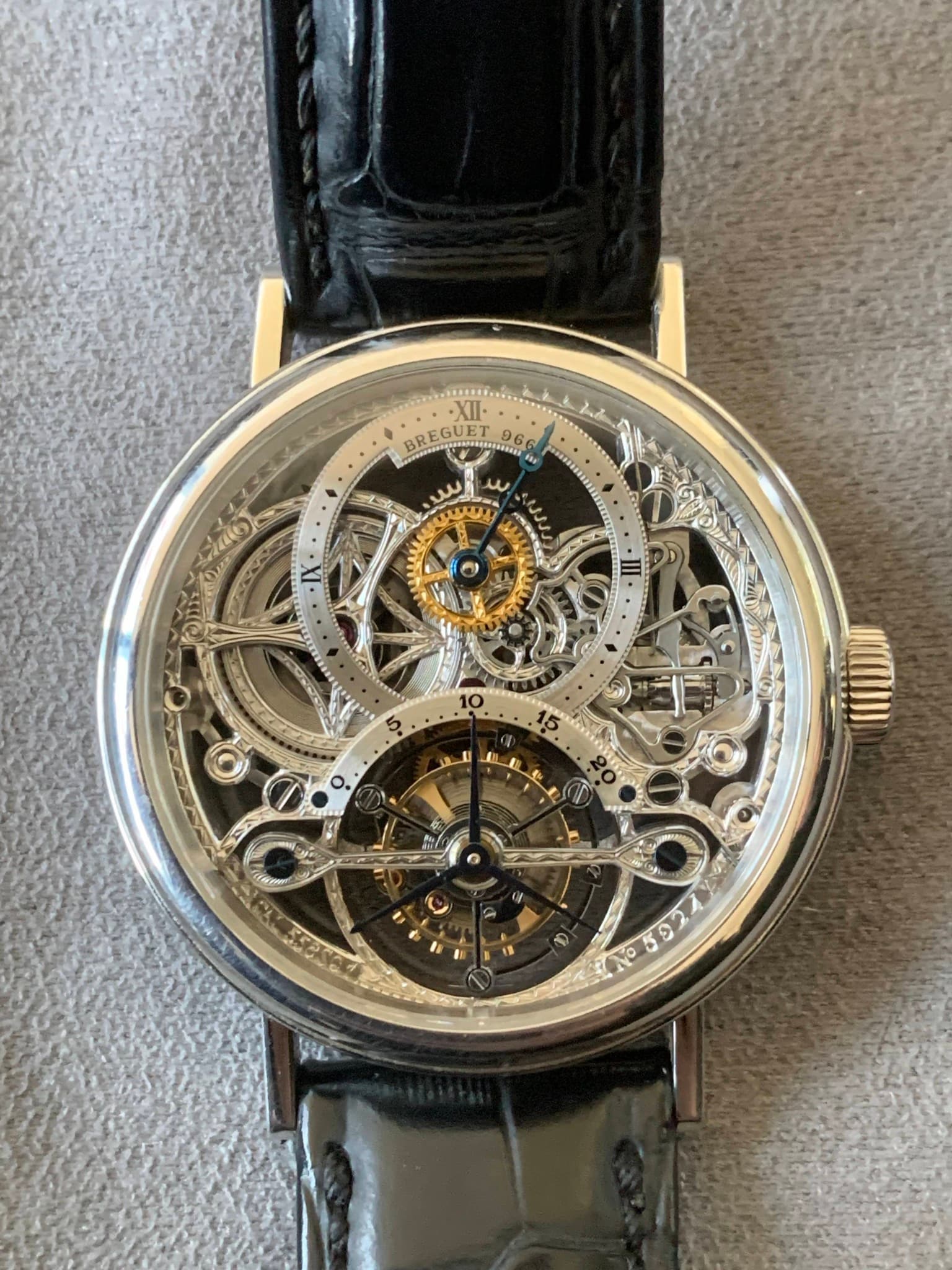 May be an image of wrist watch and text