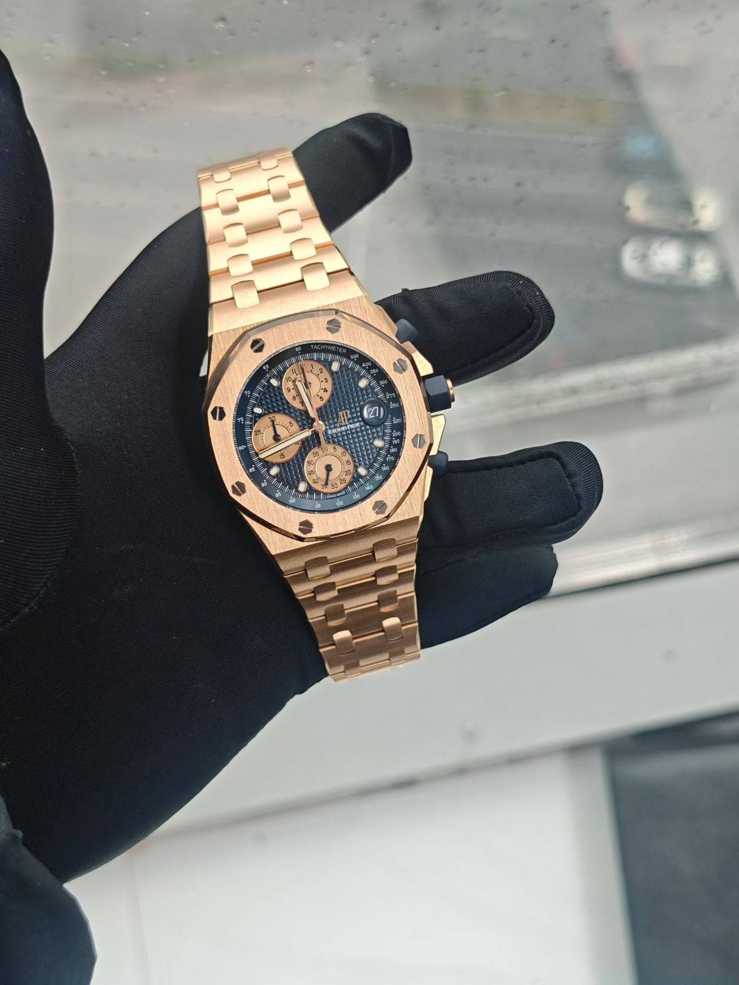 May be an image of wrist watch and text