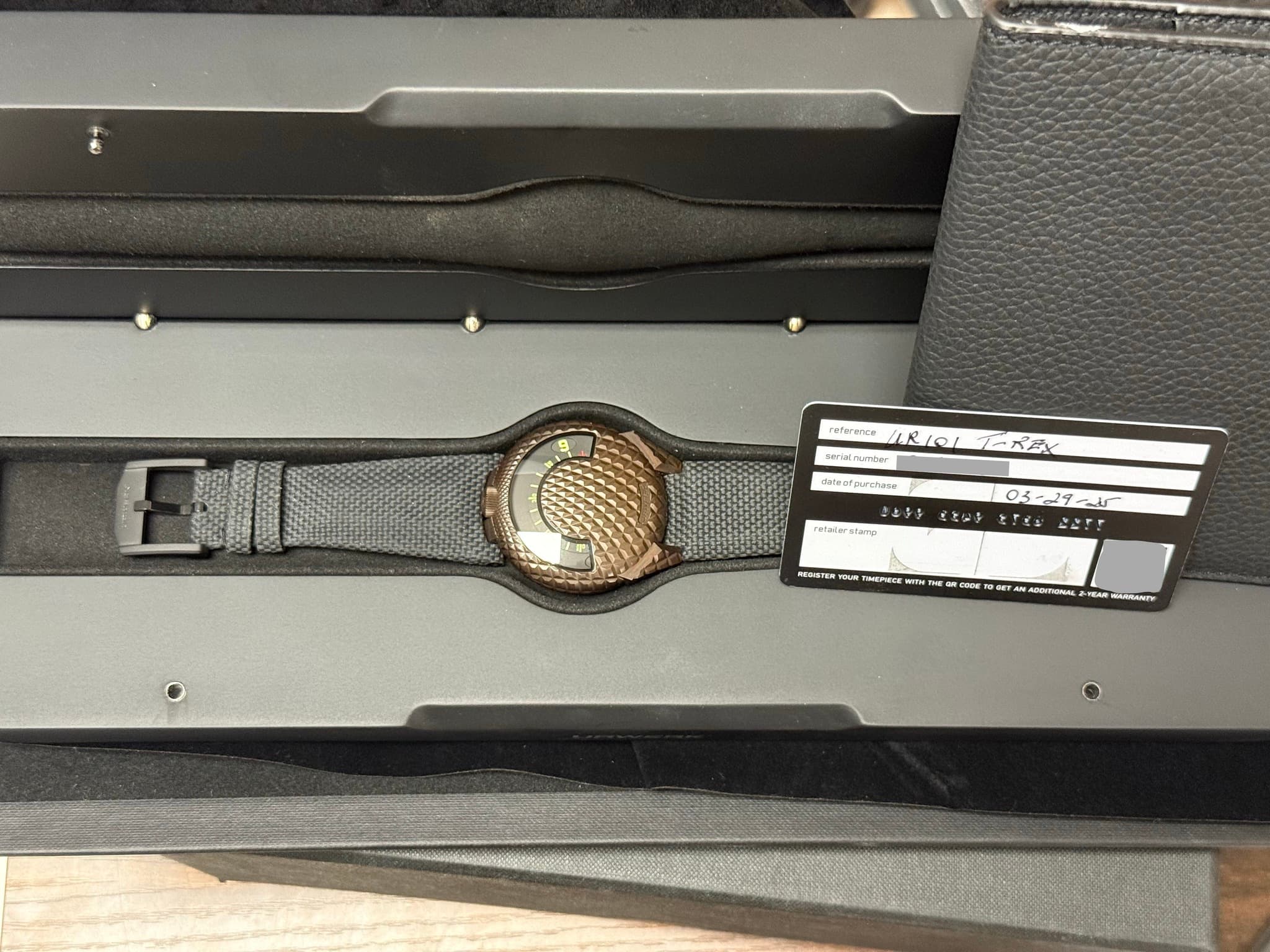 May be an image of digital watch and text