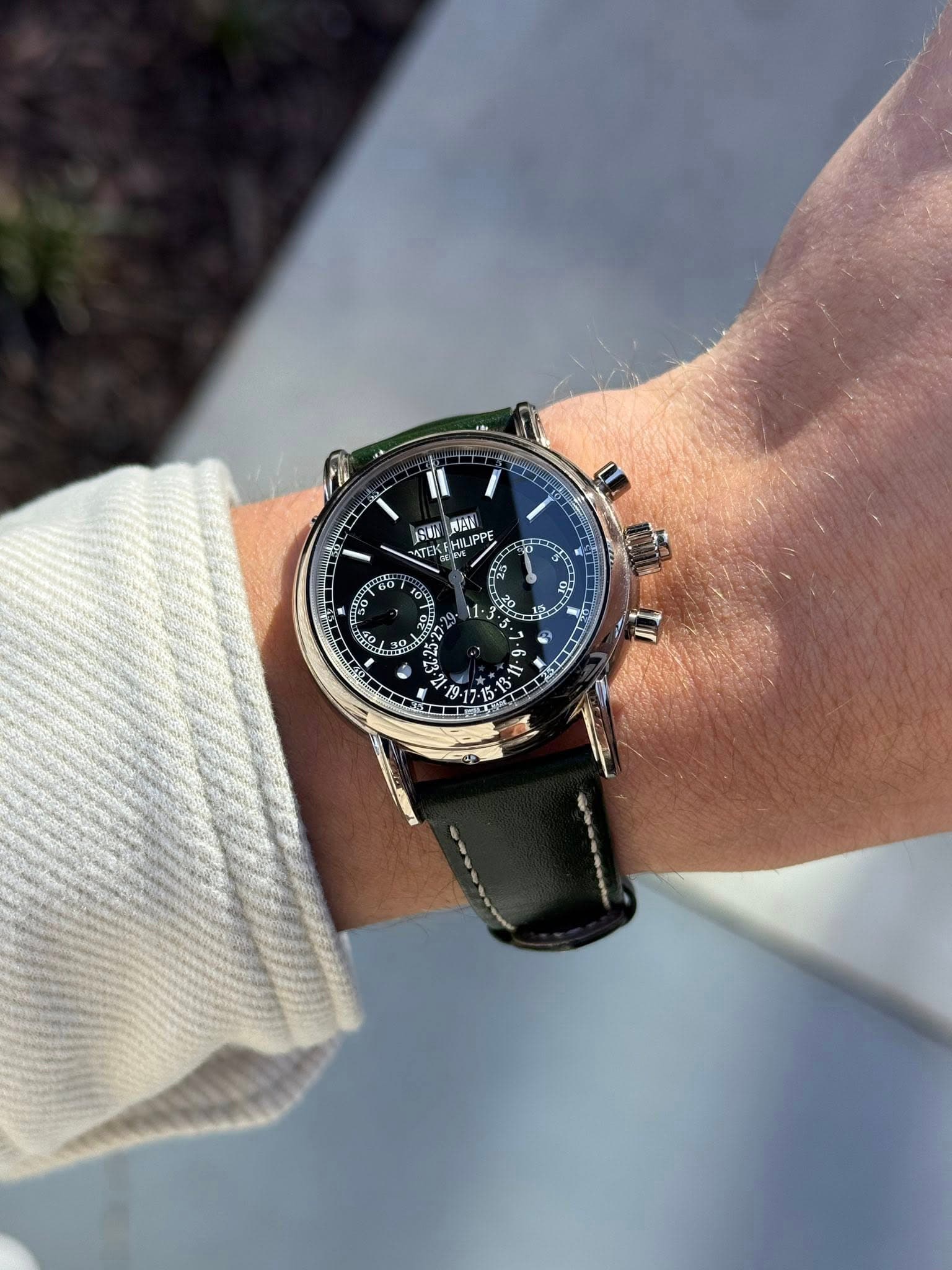 May be an image of wrist watch and text