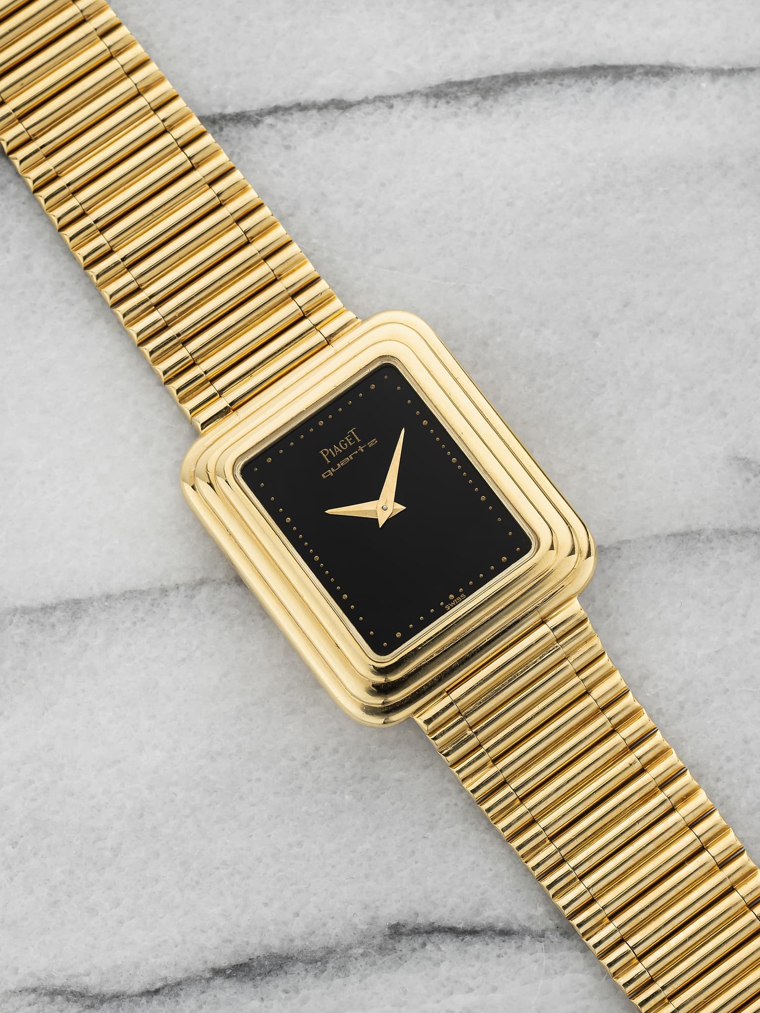 May be an image of digital watch and text