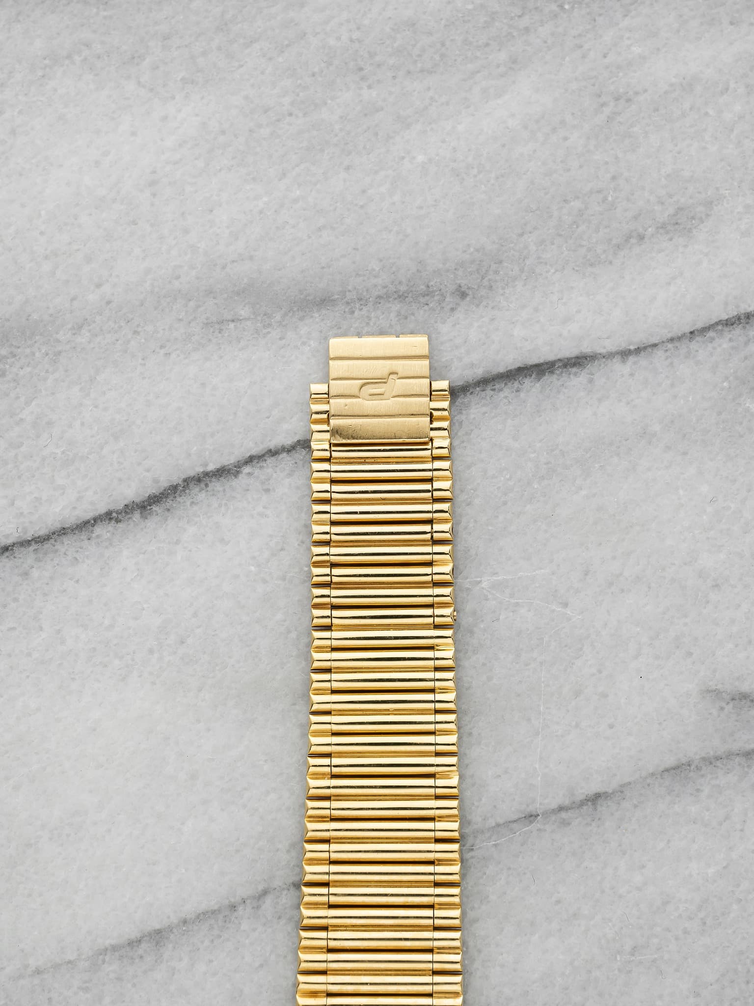 May be an image of wrist watch