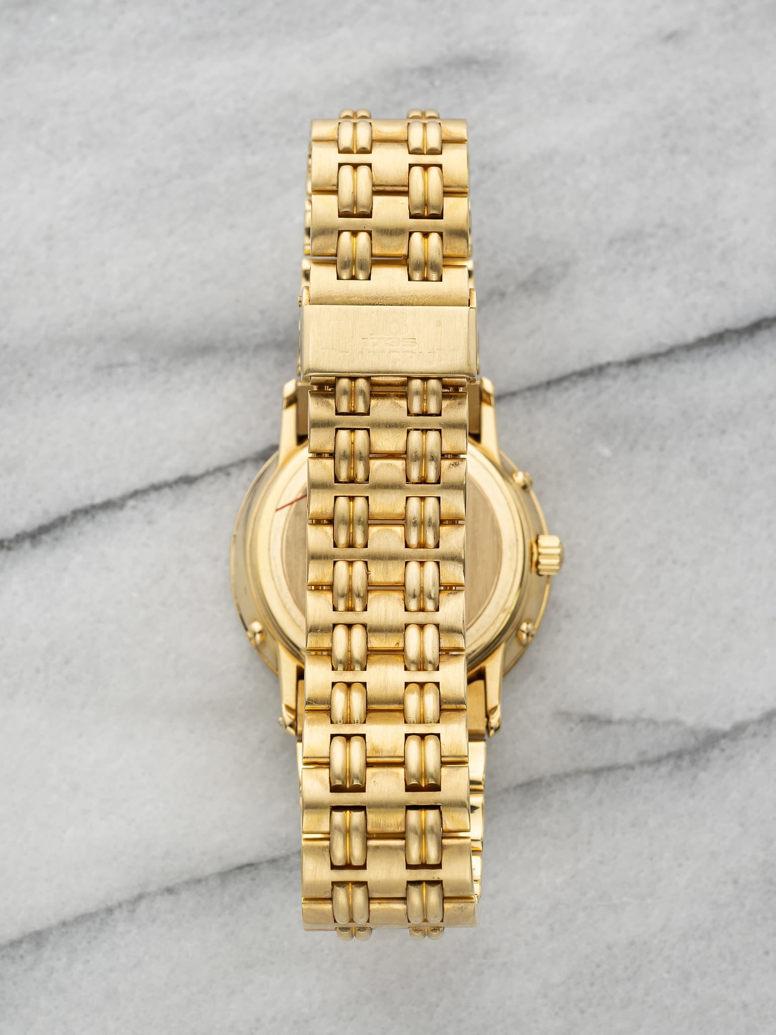 May be an image of wrist watch