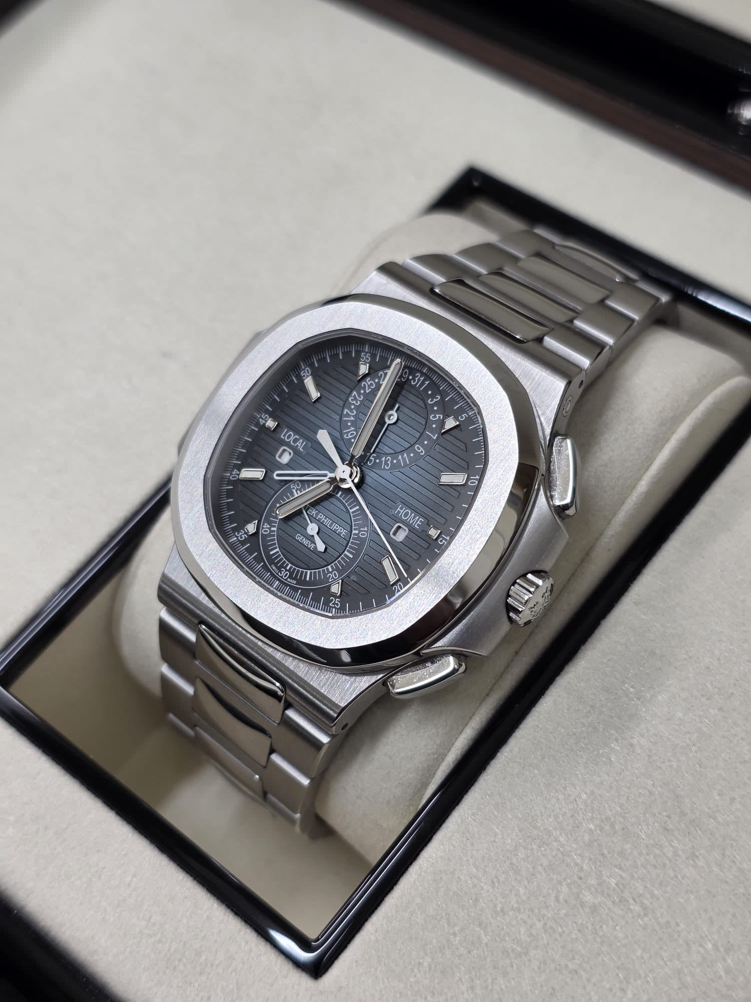 May be an image of wrist watch and text