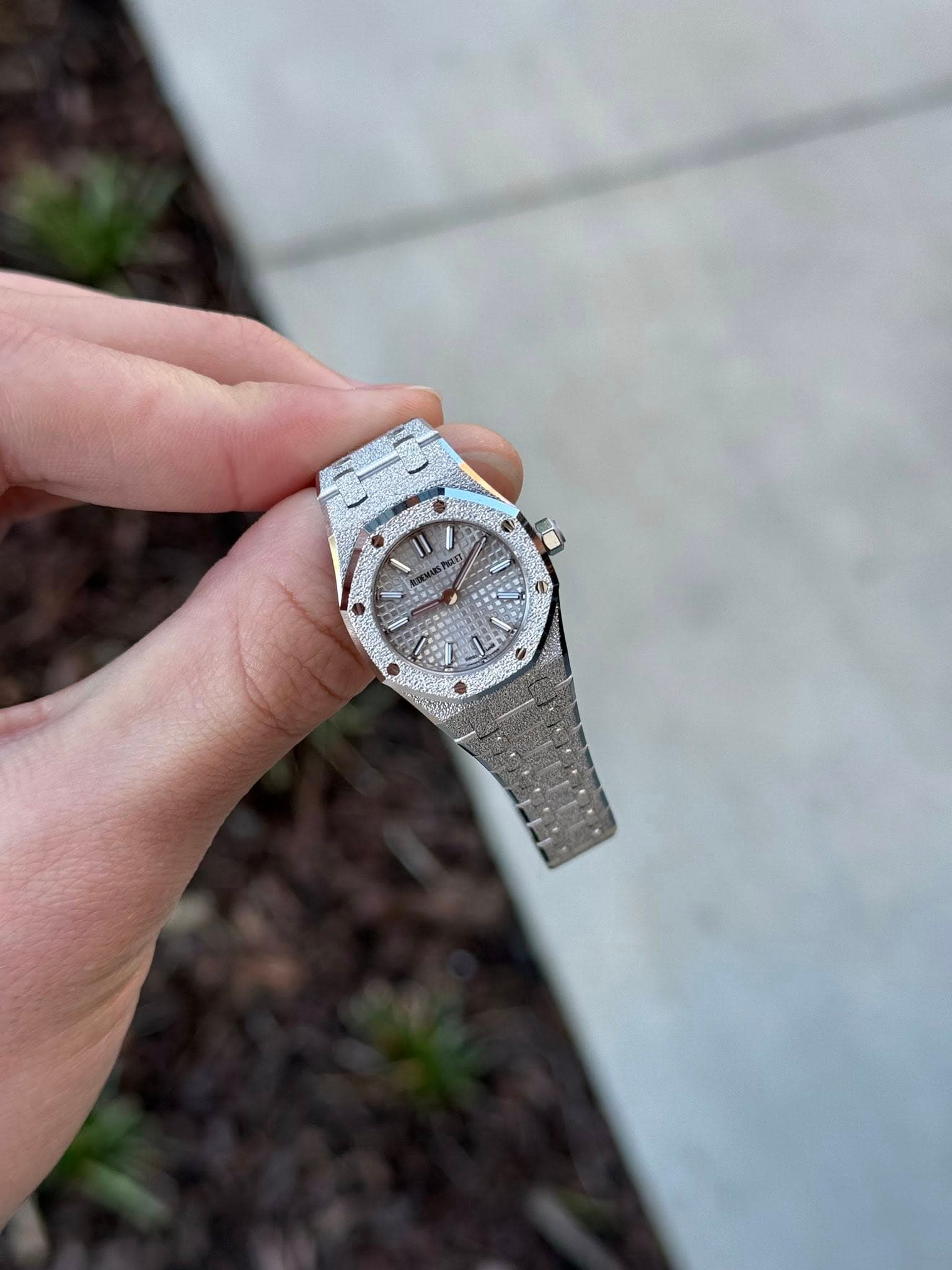 May be an image of digital watch and text