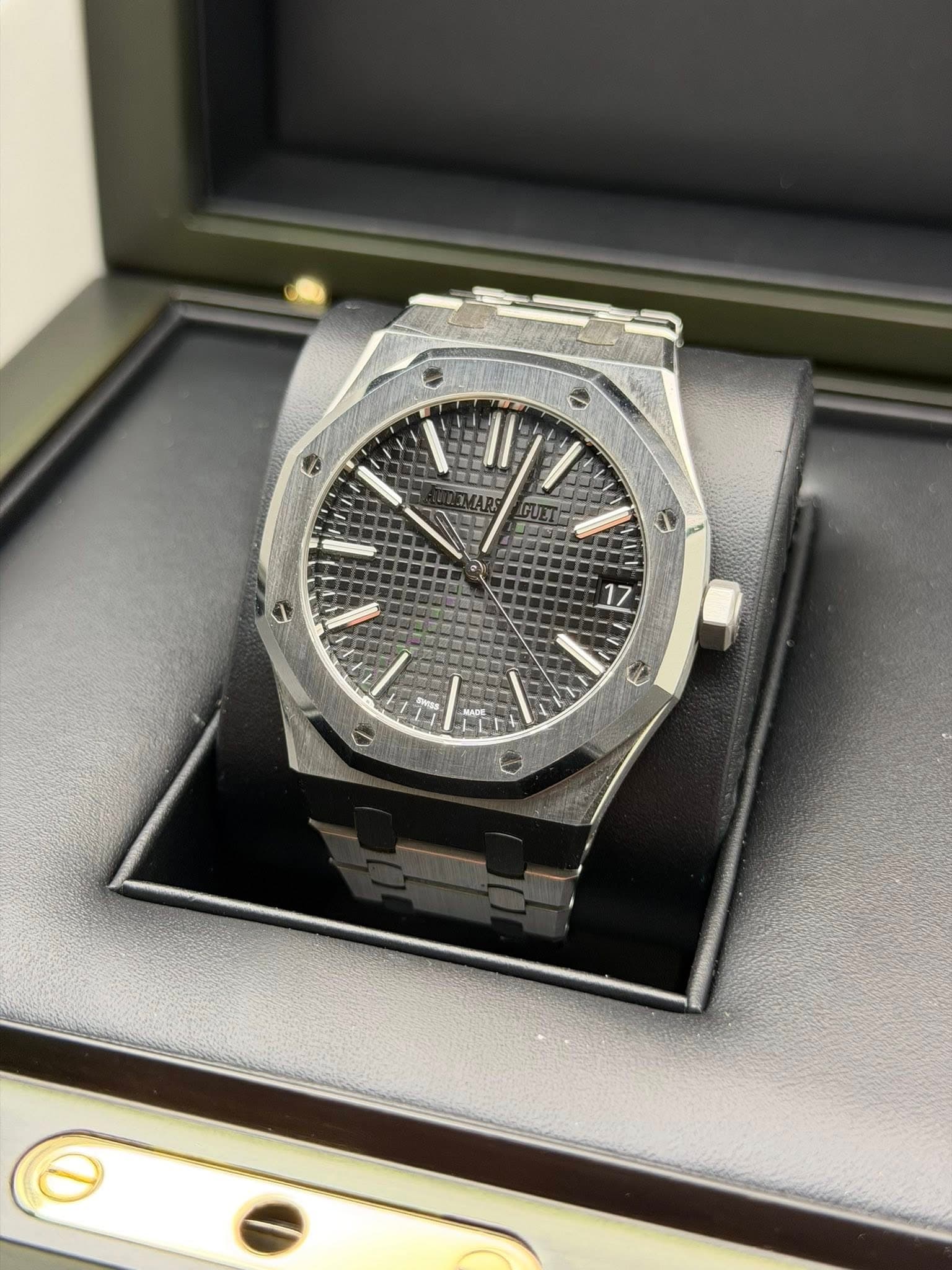 May be an image of wrist watch and text