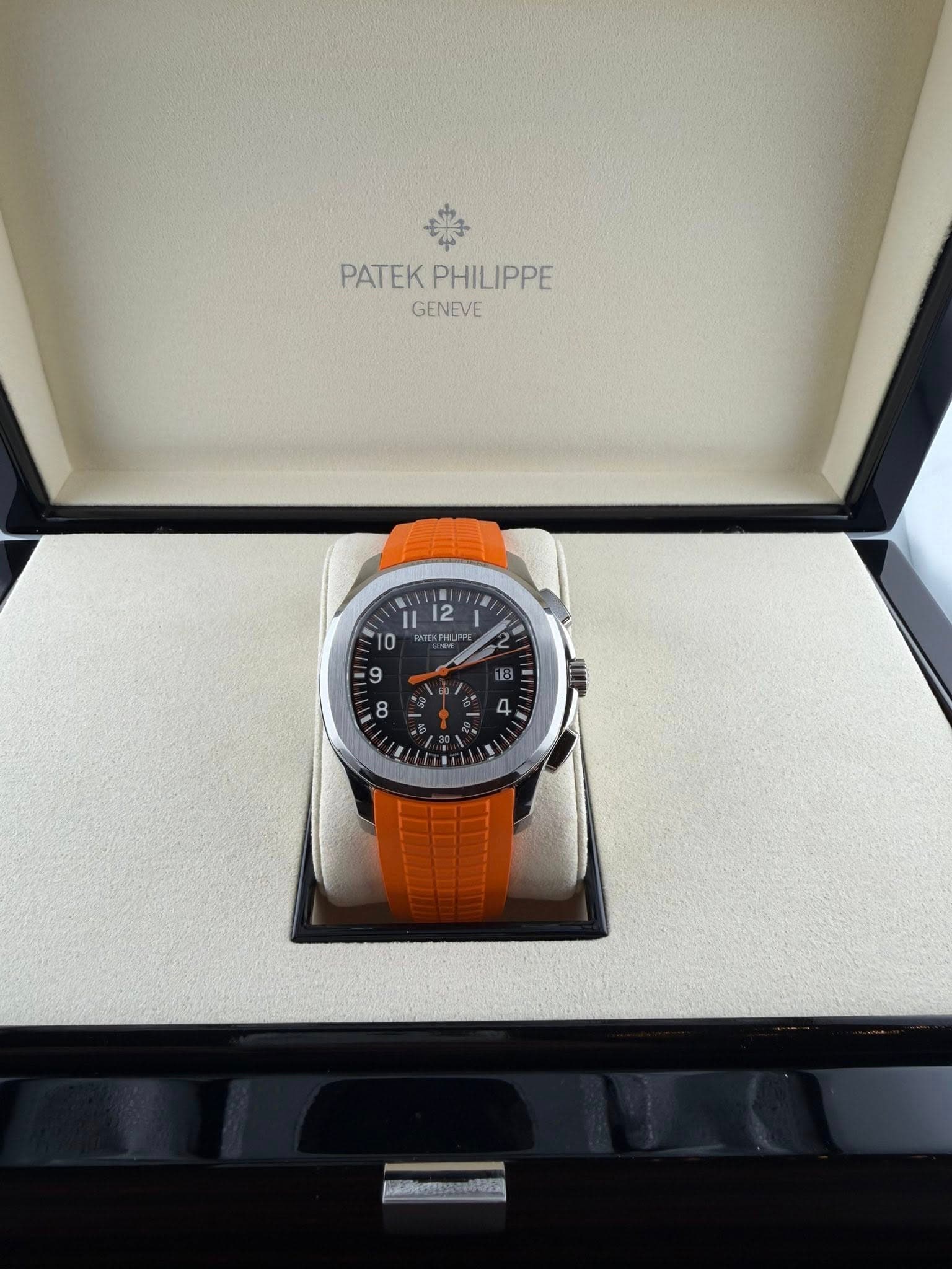 May be an image of wrist watch and text
