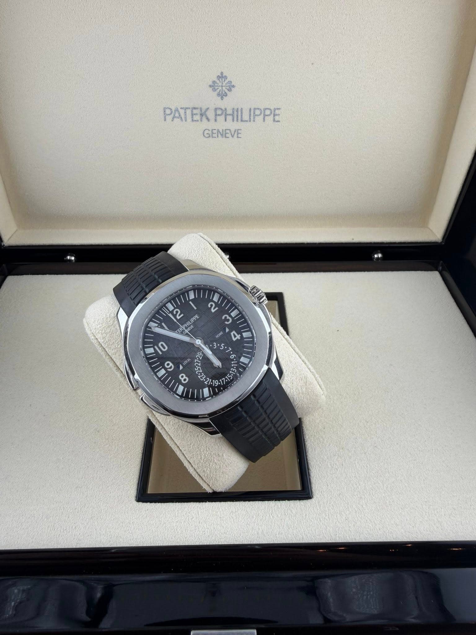 May be an image of wrist watch and text