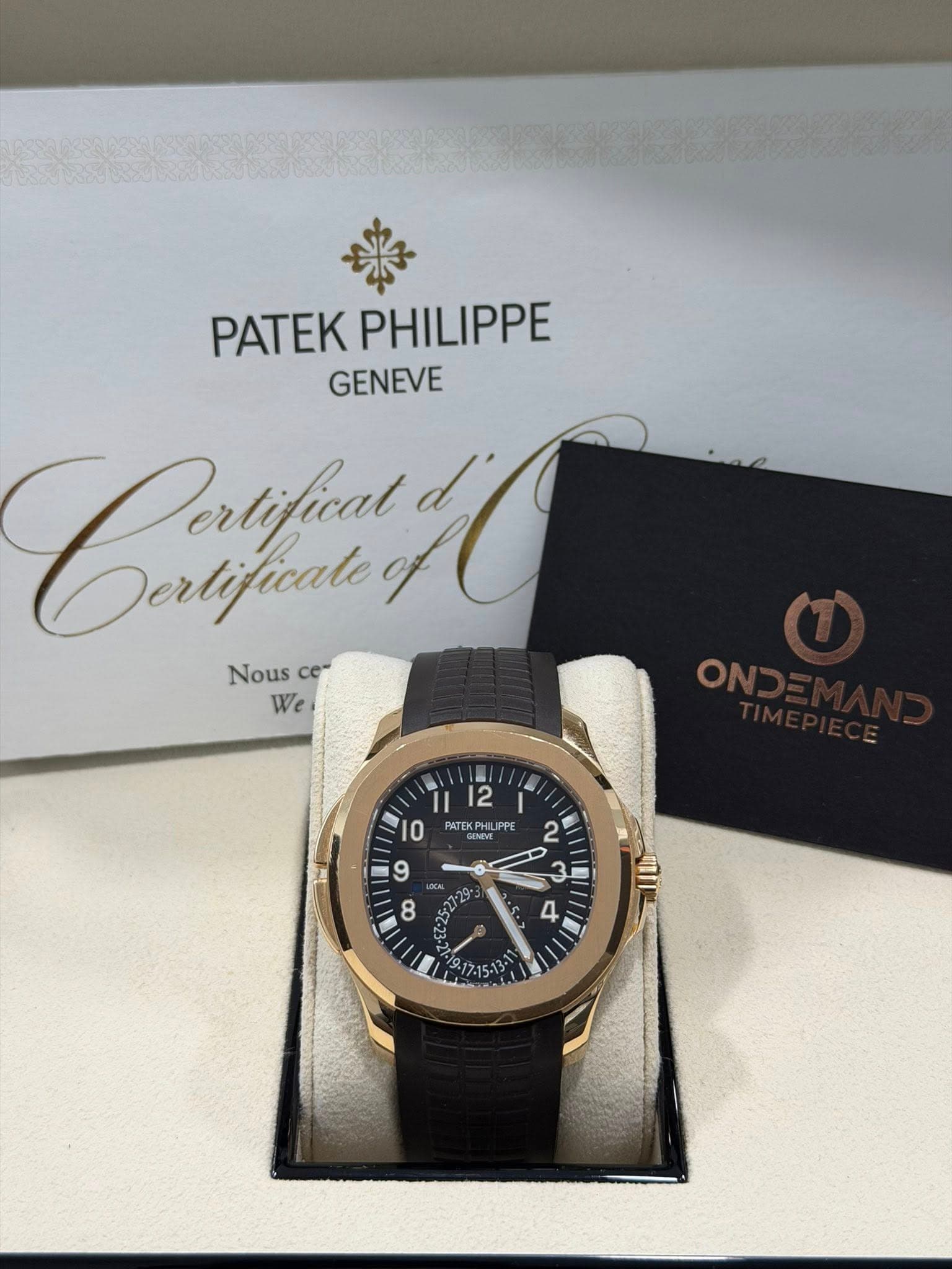 May be an image of wrist watch and text that says 'PATEK PATEKPHILIPPE PHILIPPE GENEVE Crtfuny Dertifiat d Dertificale Nous Nousce ce" We PNTEKPHUPPE PATEH PPE 2 9 3i '