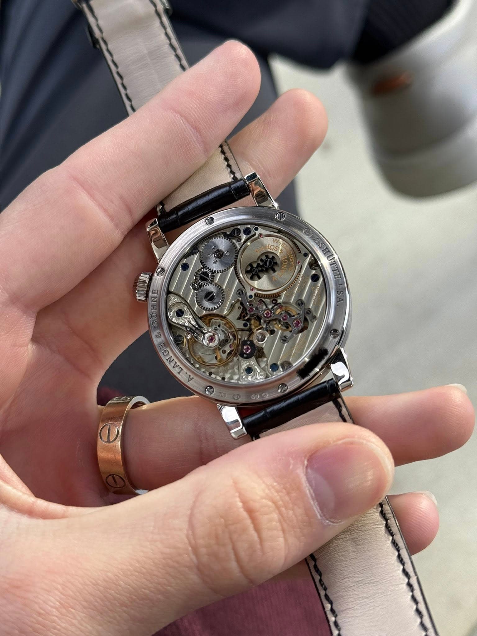 May be an image of wrist watch