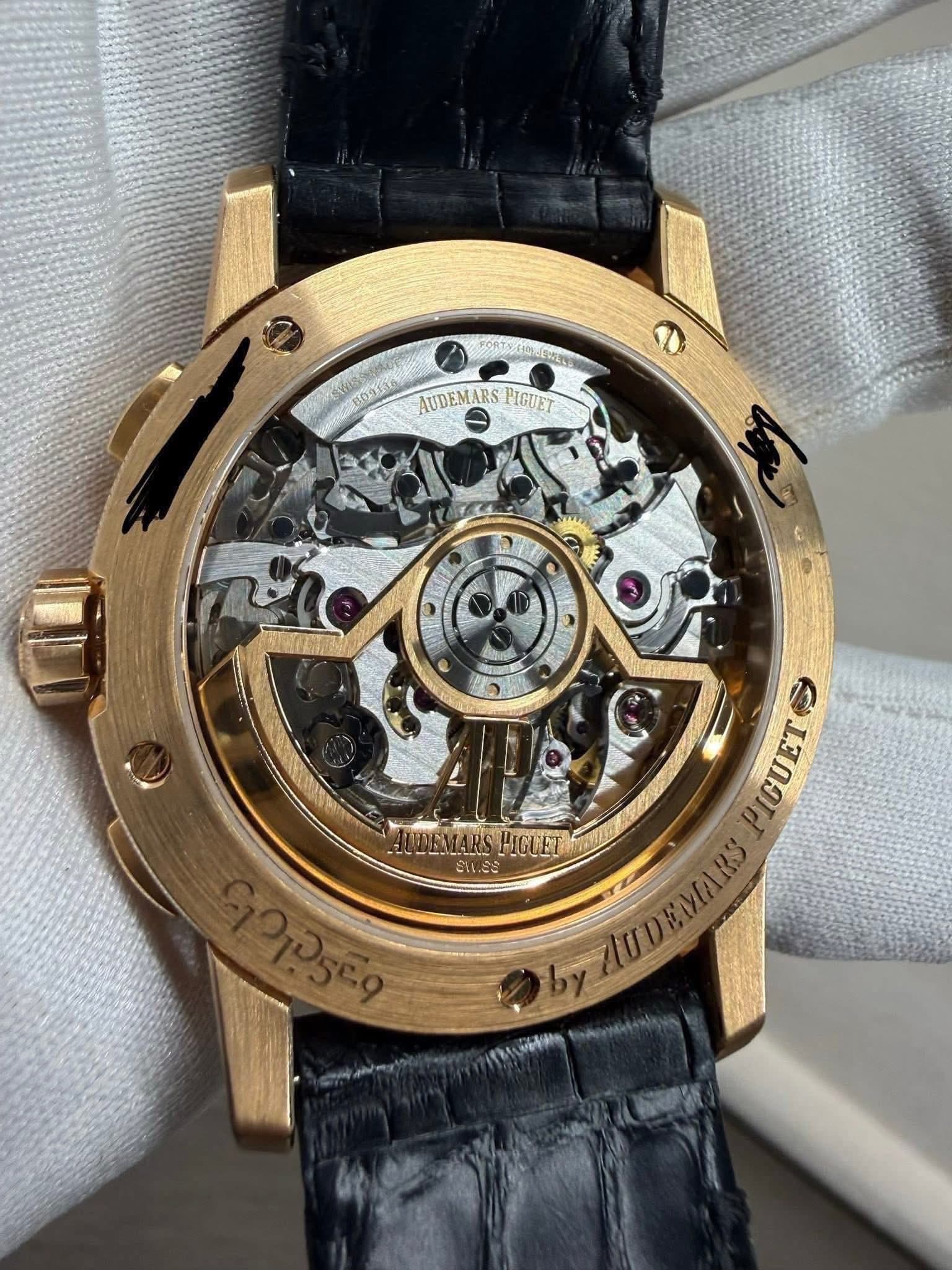 May be an image of wrist watch and text