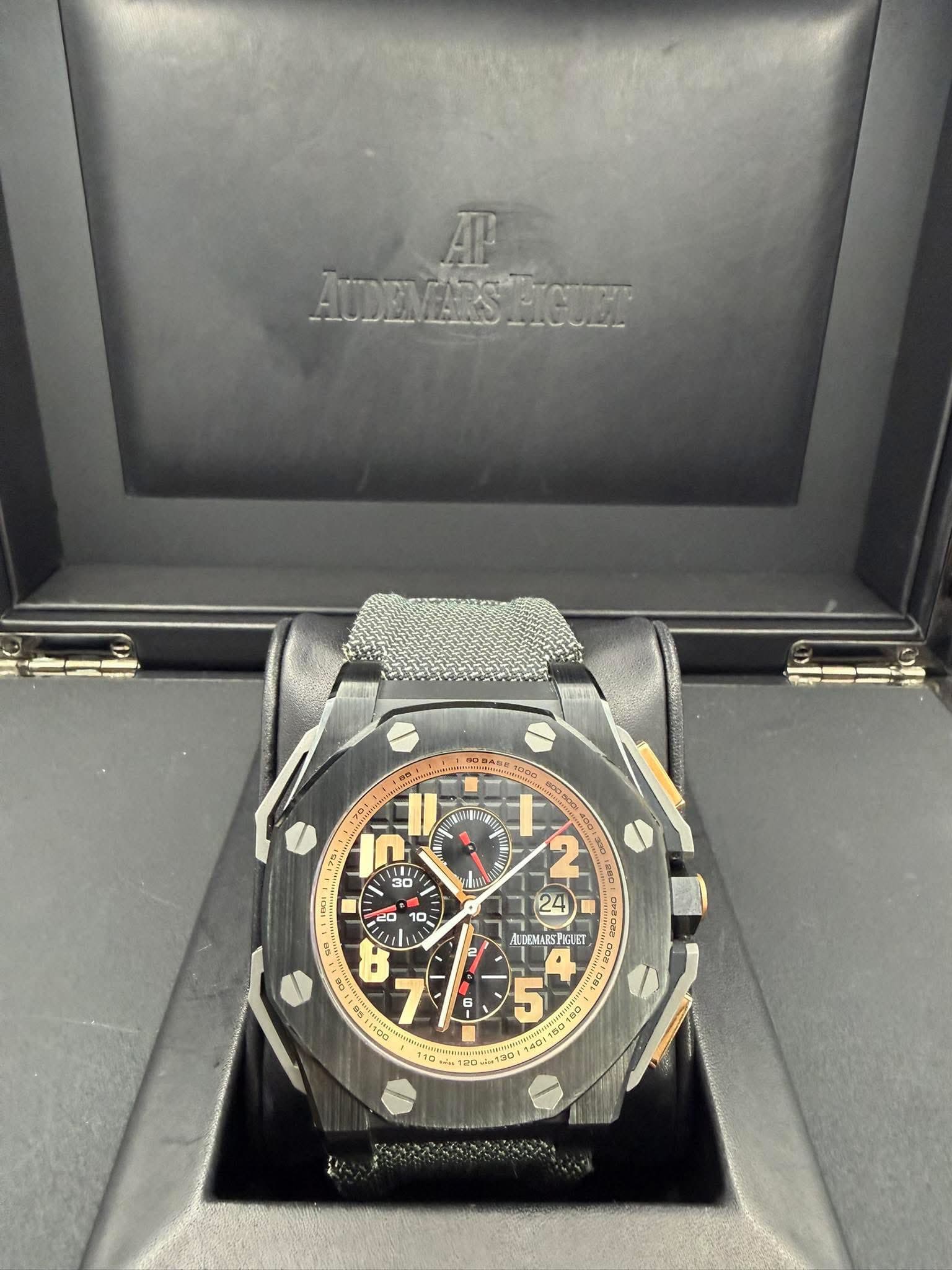 May be an image of wrist watch and text