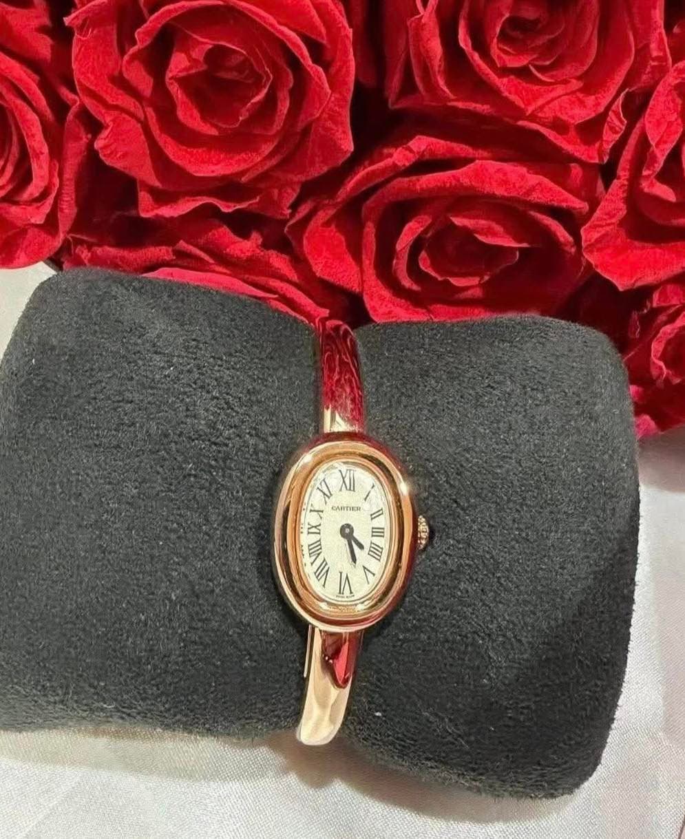 May be an image of digital watch, jewelry and text