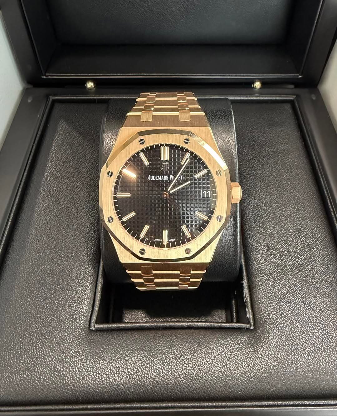 May be an image of wrist watch and text