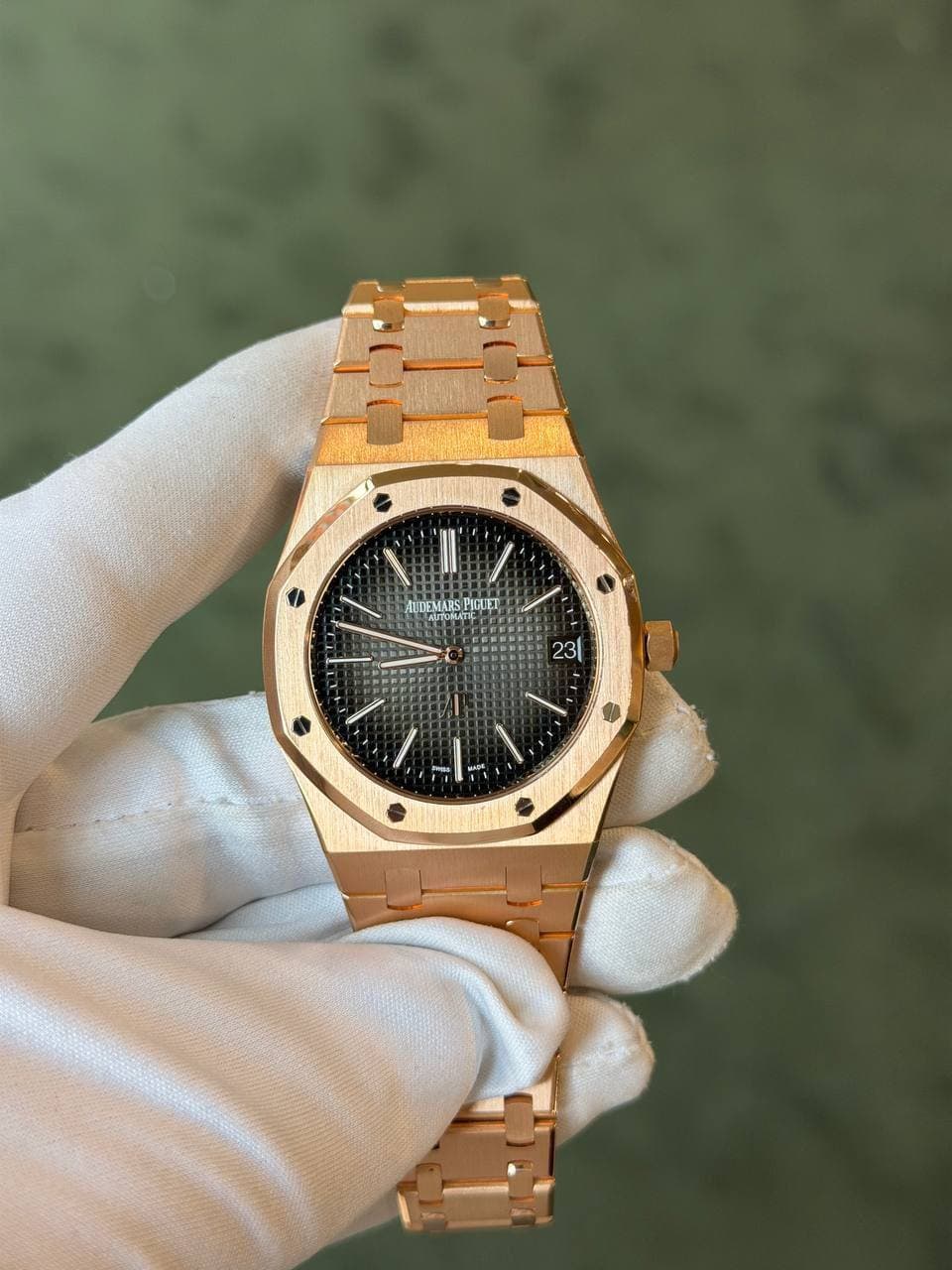 May be an image of wrist watch and text