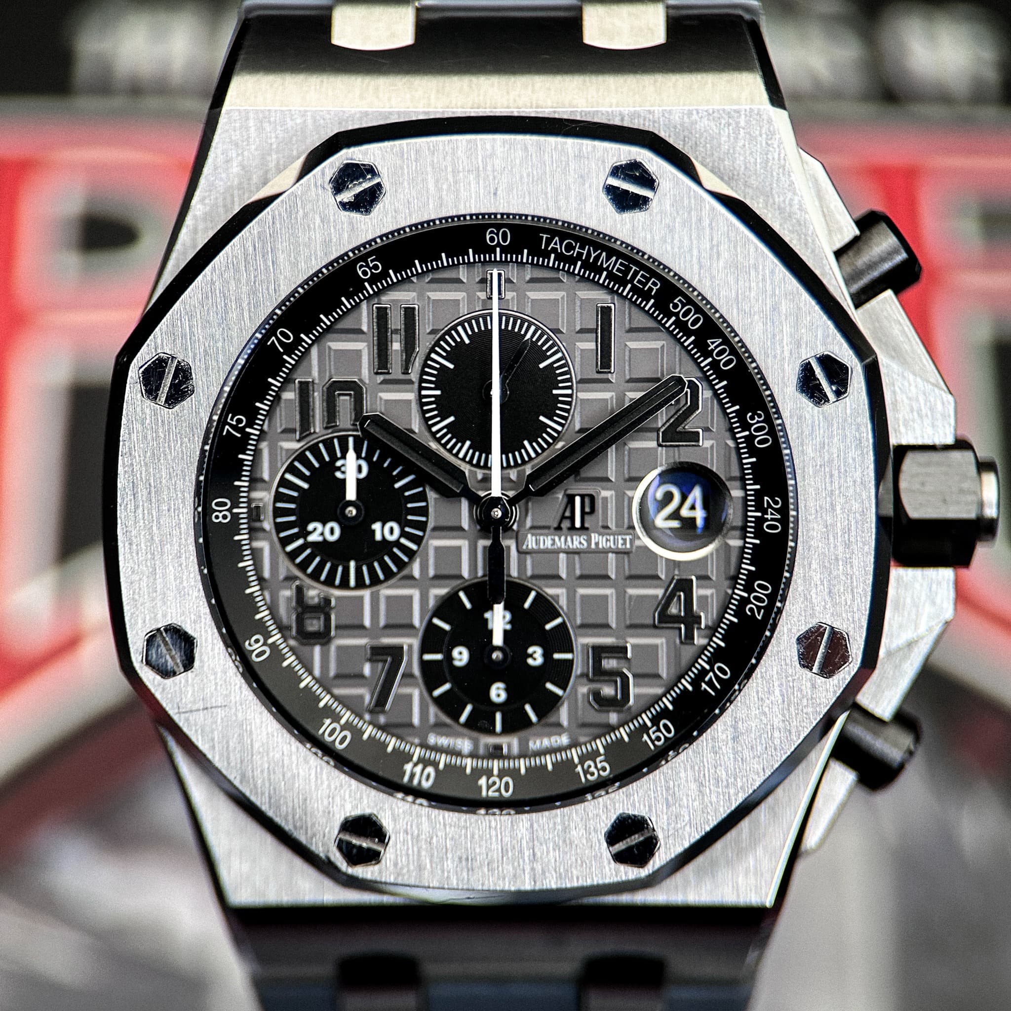May be an image of wrist watch and text