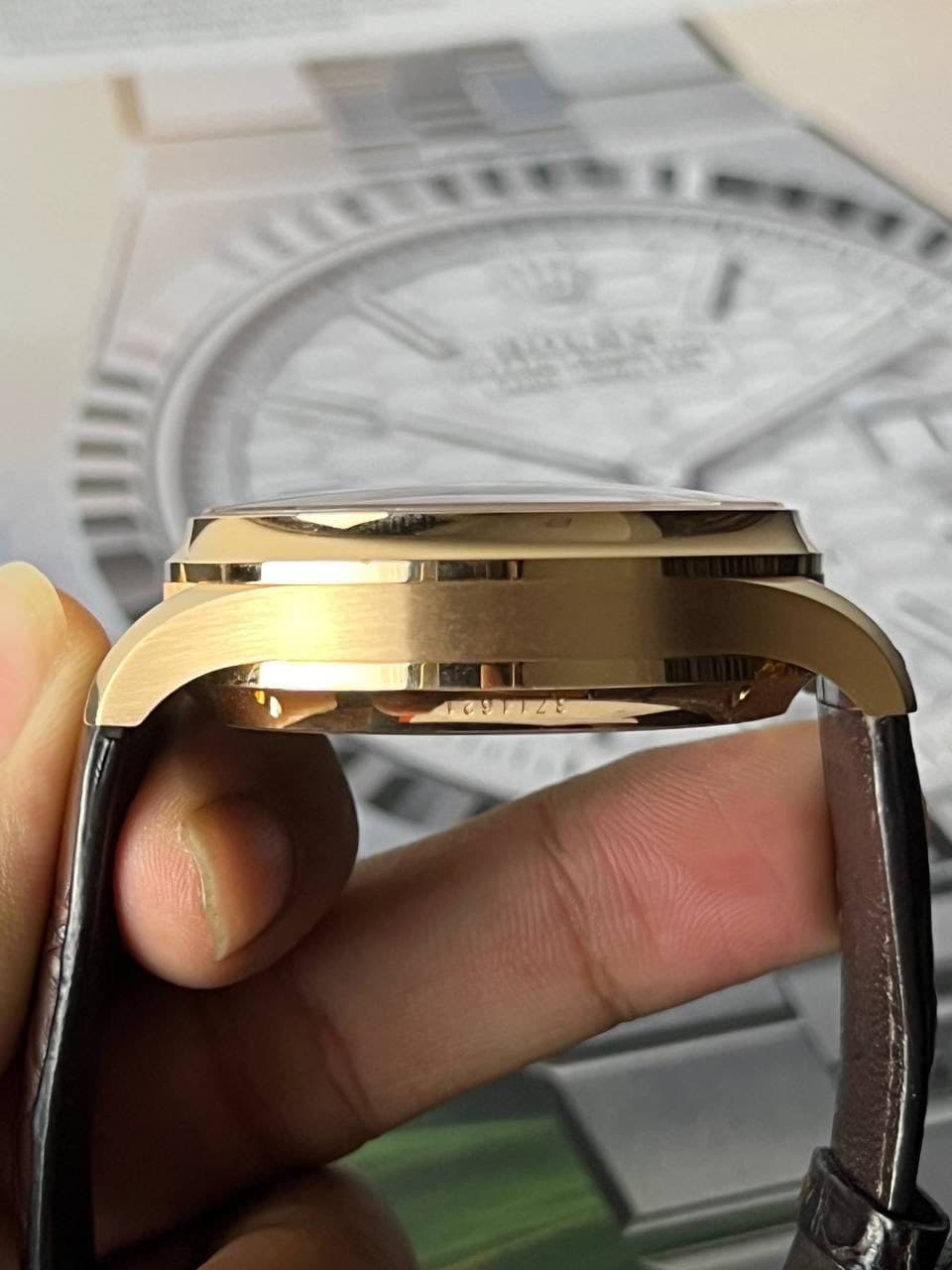 May be an image of wrist watch and text