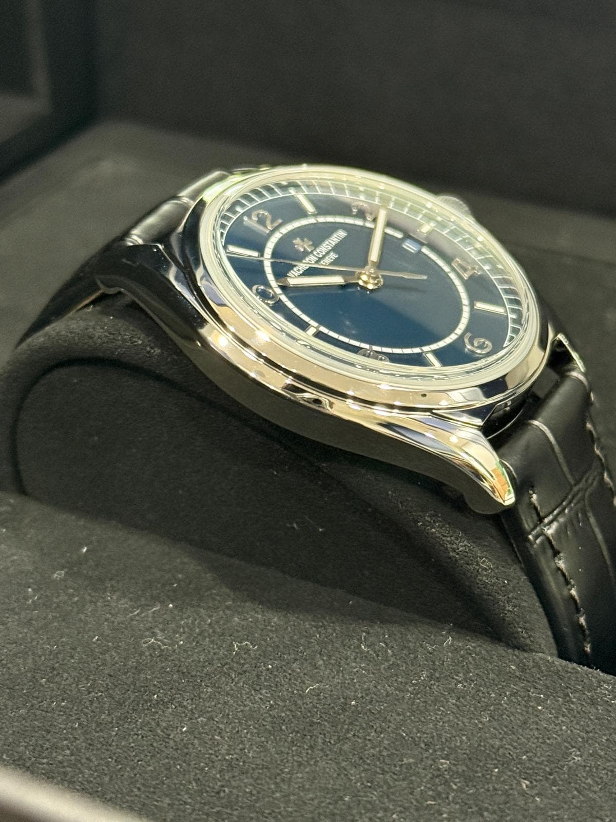 May be an image of wrist watch and text