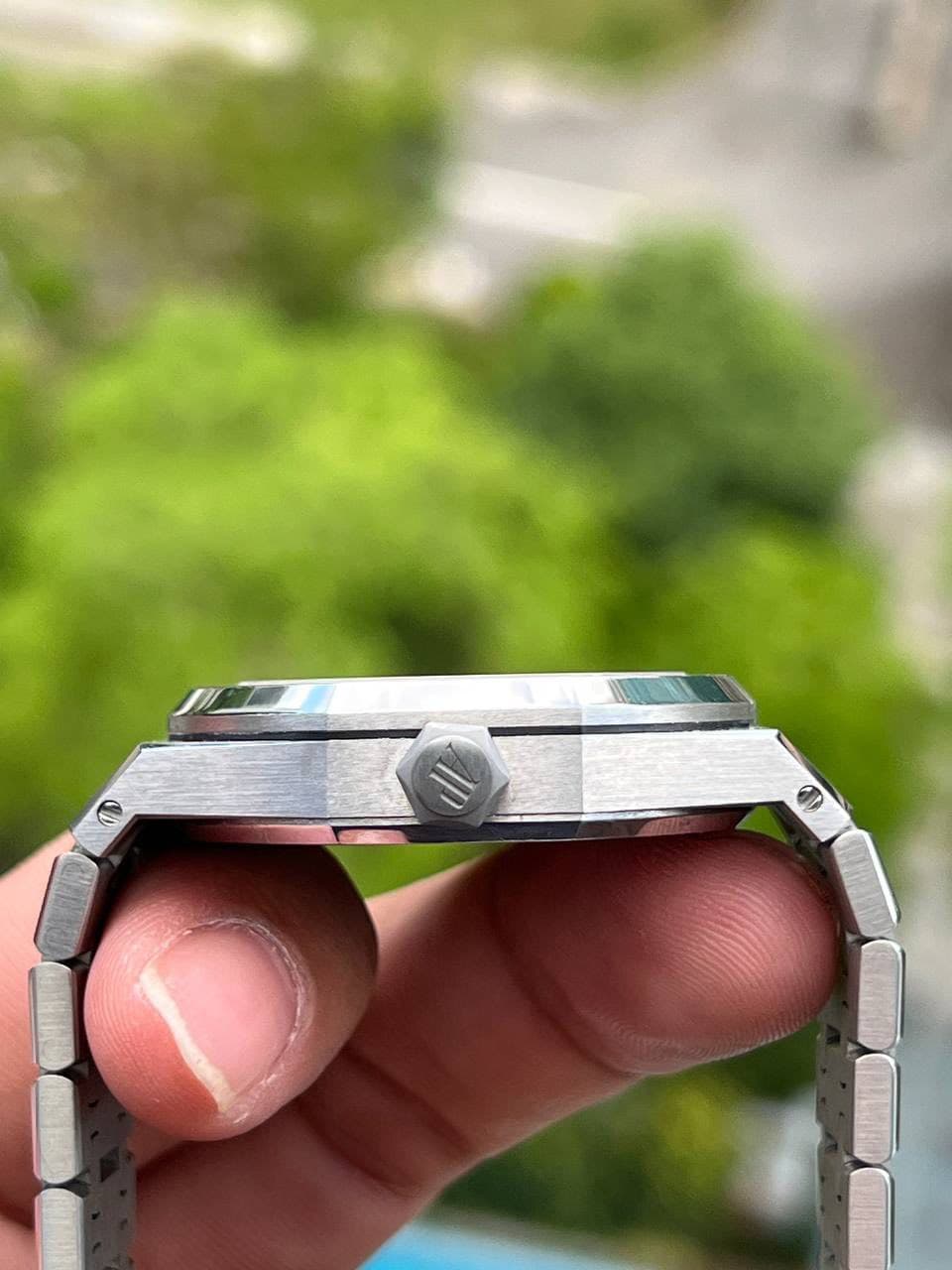 May be an image of wrist watch