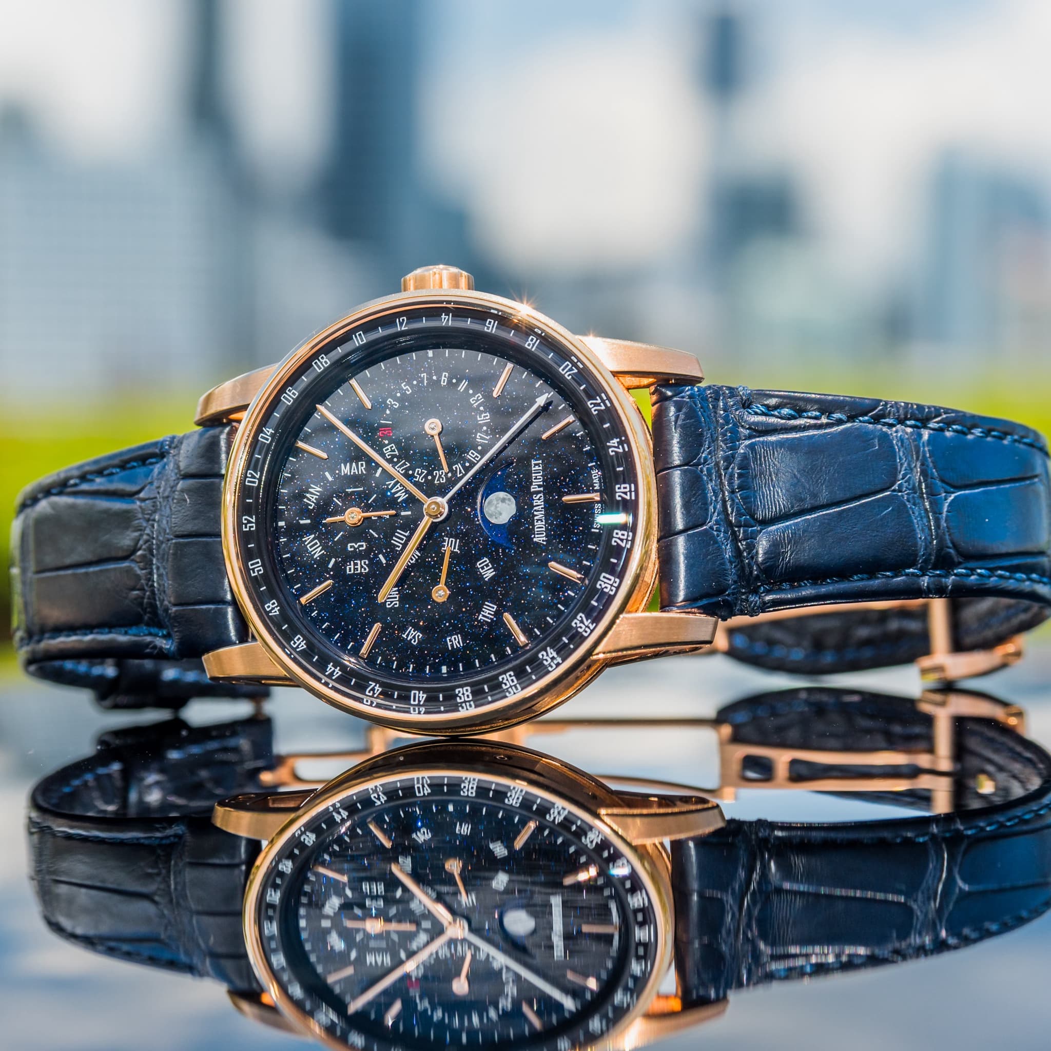 May be an image of wrist watch and text