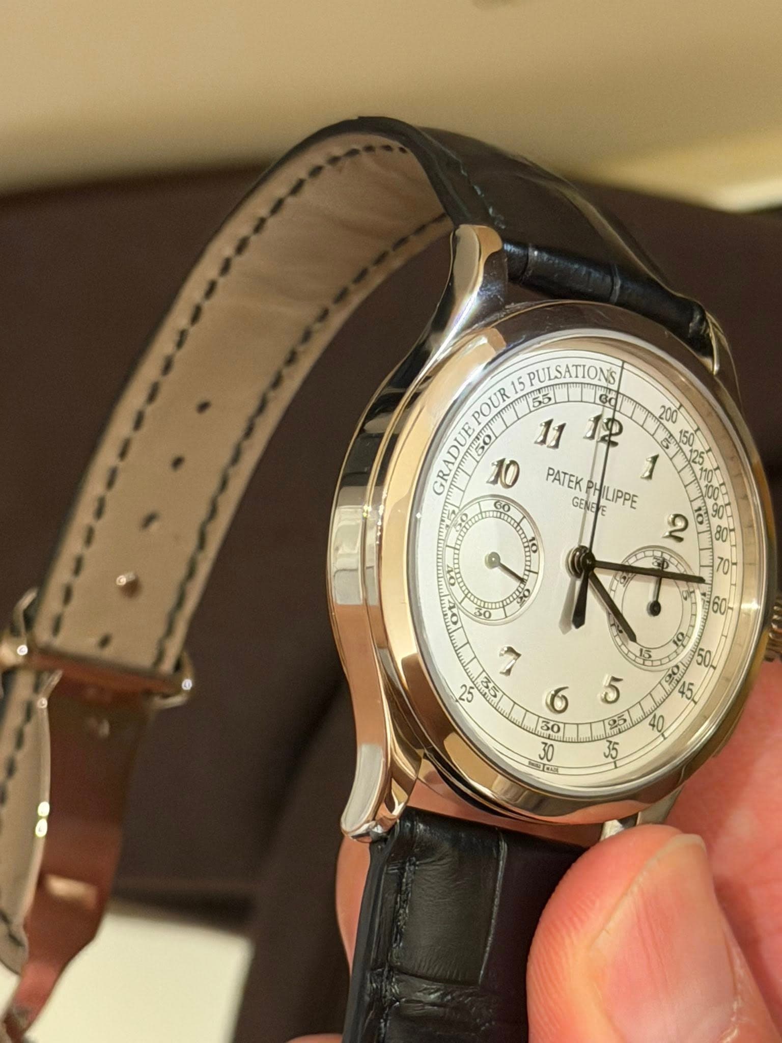 May be an image of wrist watch and text that says '5 PULSATIONS POUR 55 Gd GRADUEP ADUE PATEK GENEE LIPPE 60 PATEKPHILIPPE 1 PRSE 2 2 C IN TINO 60 သ u5'