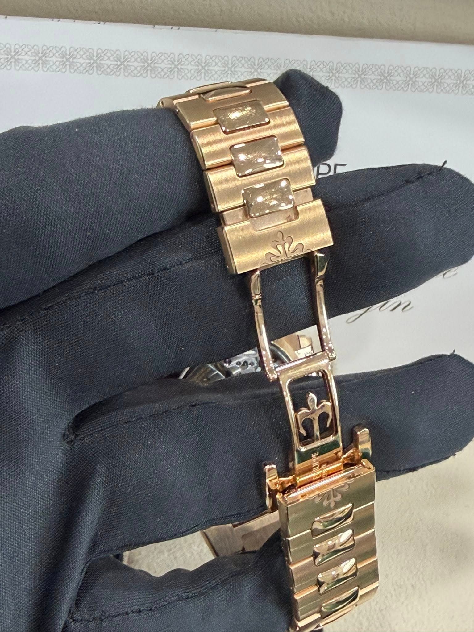 May be an image of jewelry, wrist watch and leather