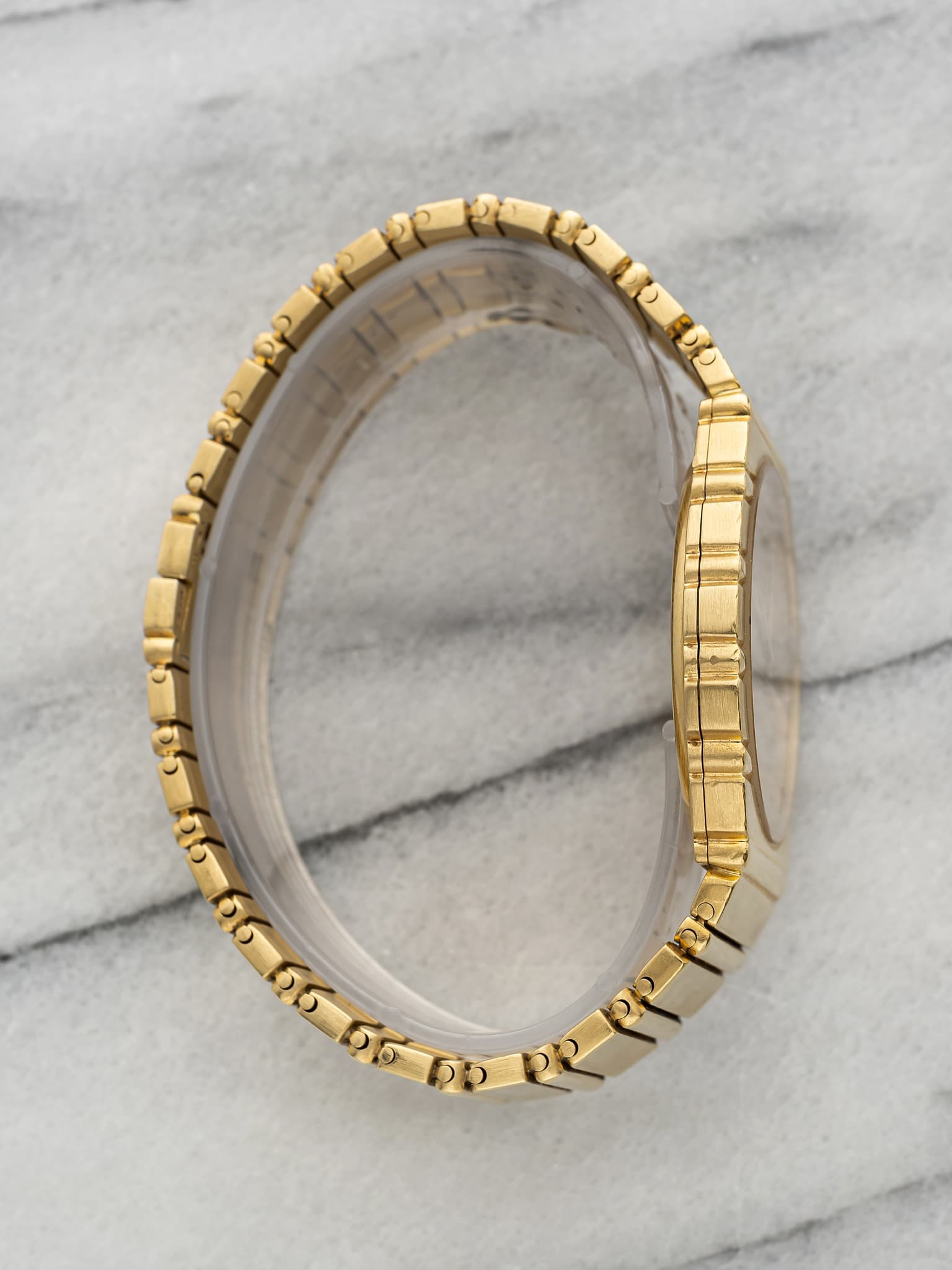 May be an image of jewelry and text
