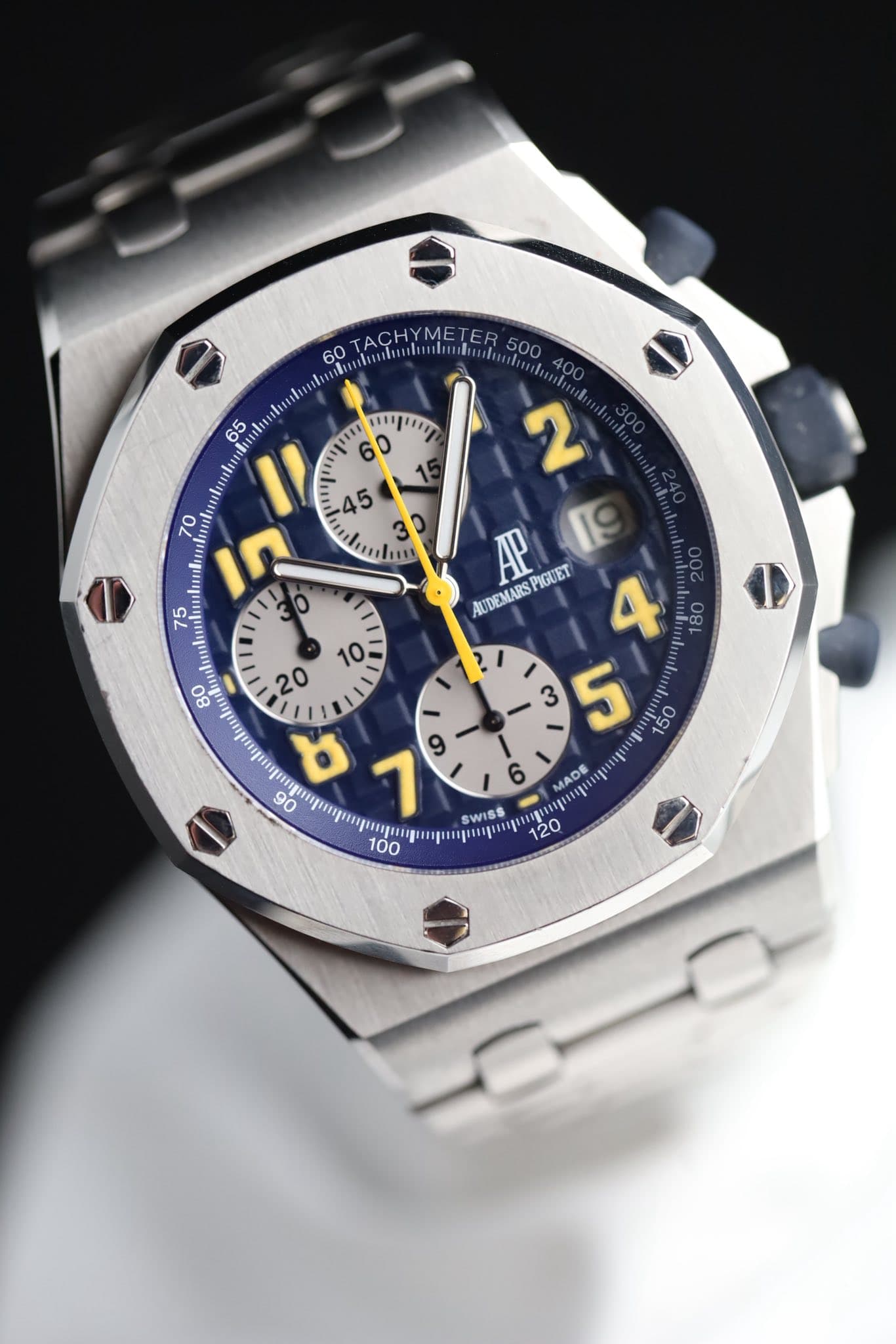 May be an image of wrist watch and text