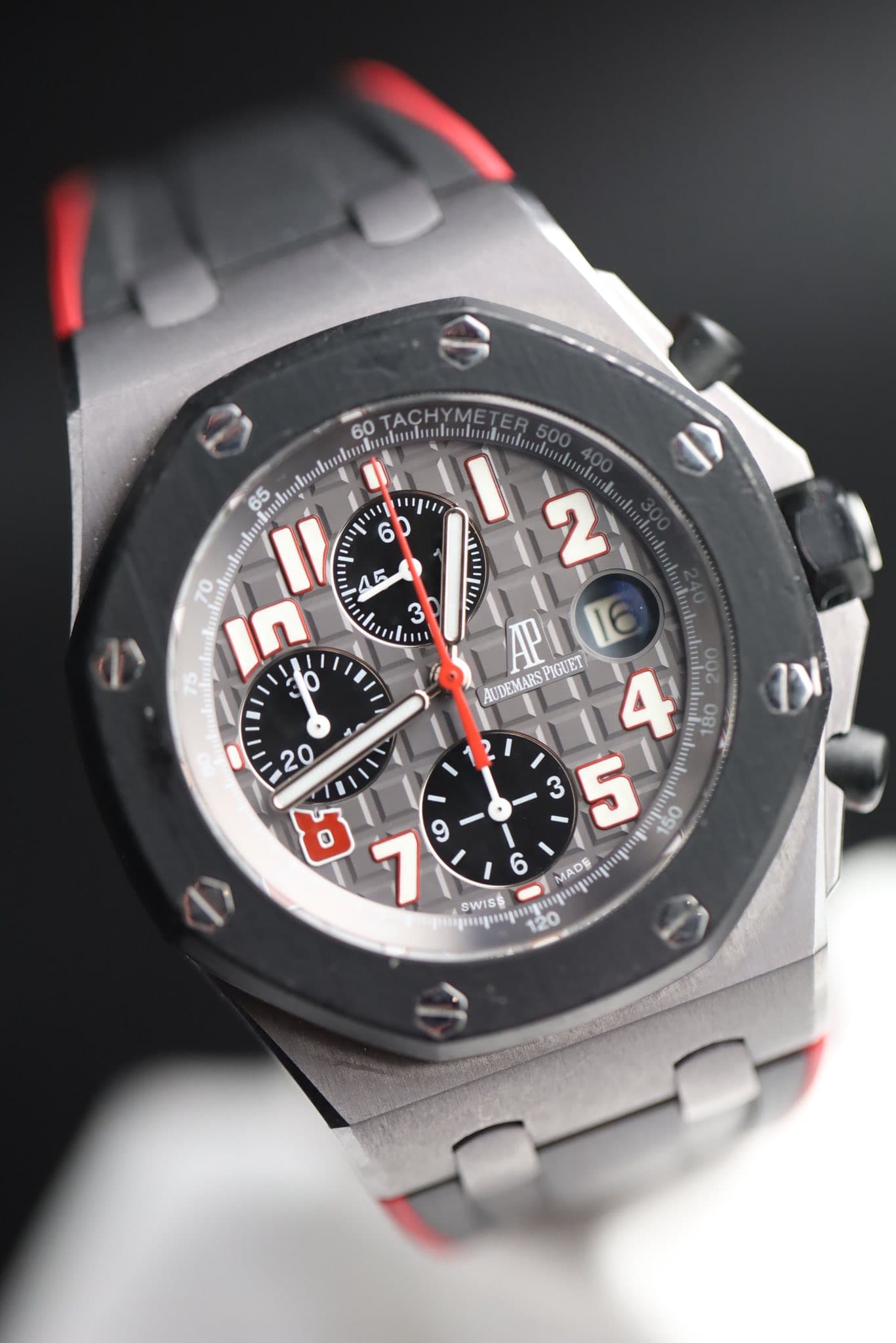 May be an image of wrist watch and text