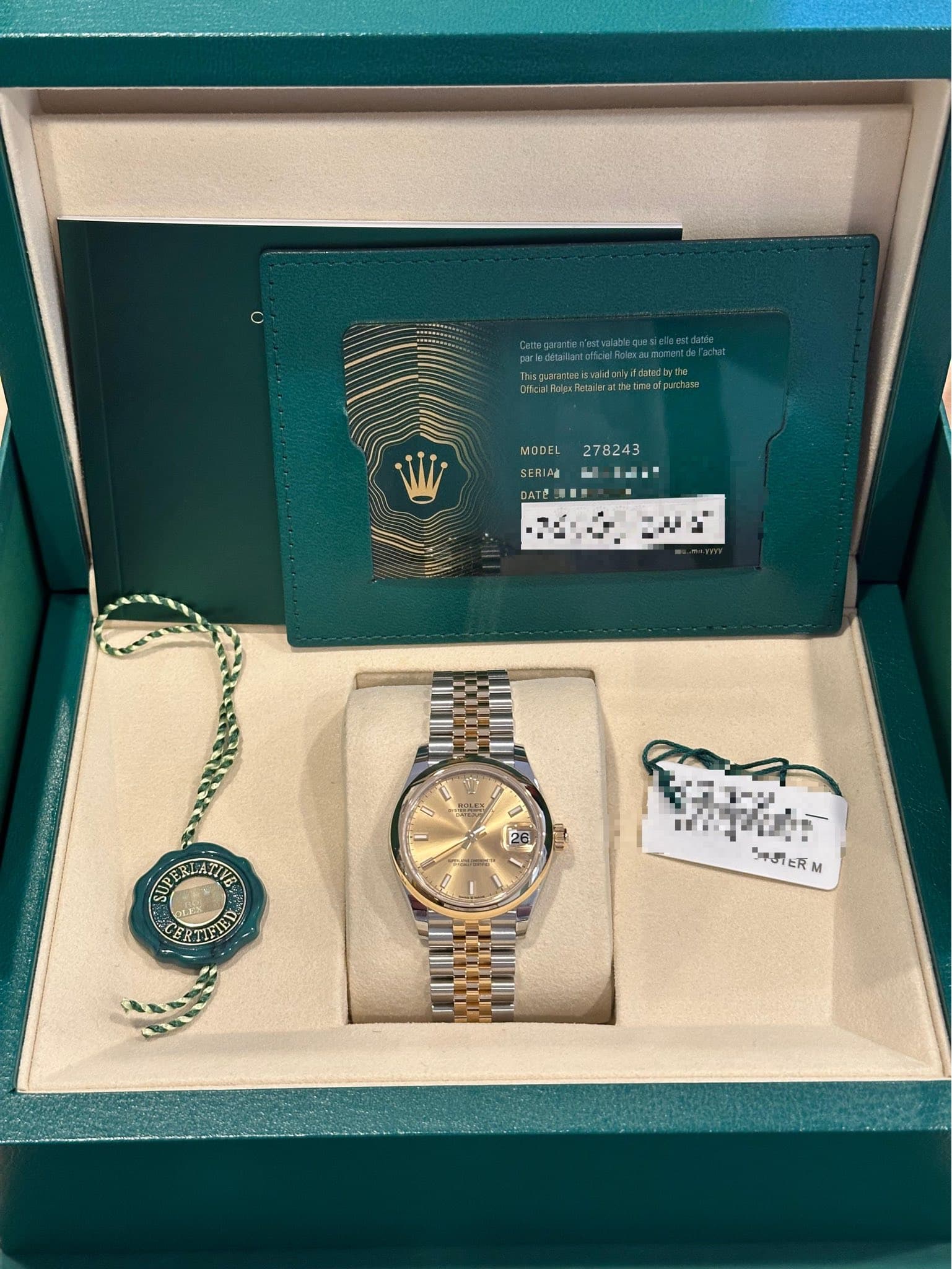May be an image of wrist watch, jewelry and text