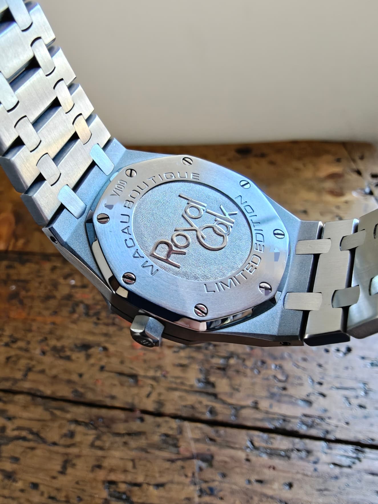 May be an image of wrist watch and text