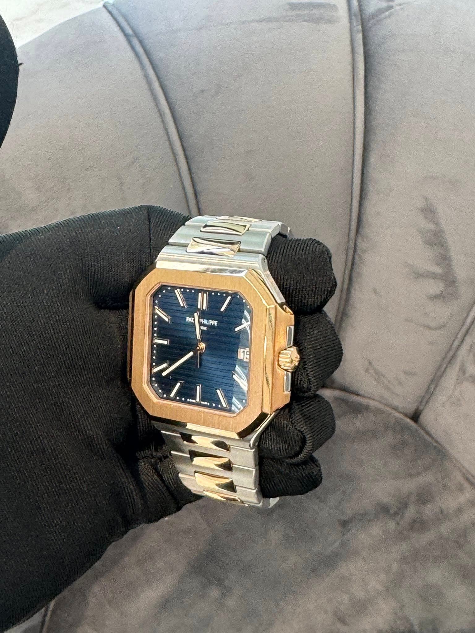 May be an image of wrist watch and text