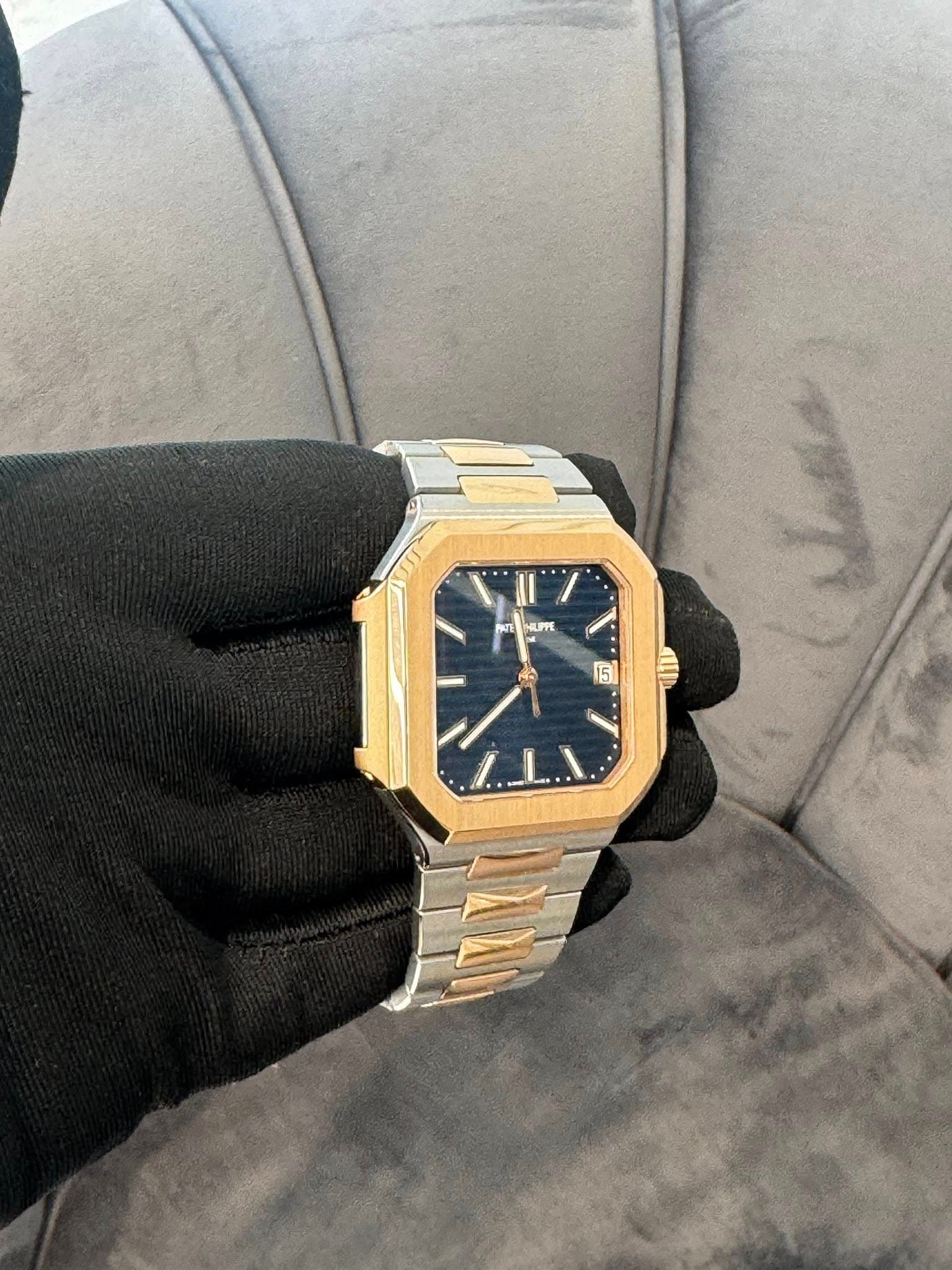 May be an image of wrist watch and text