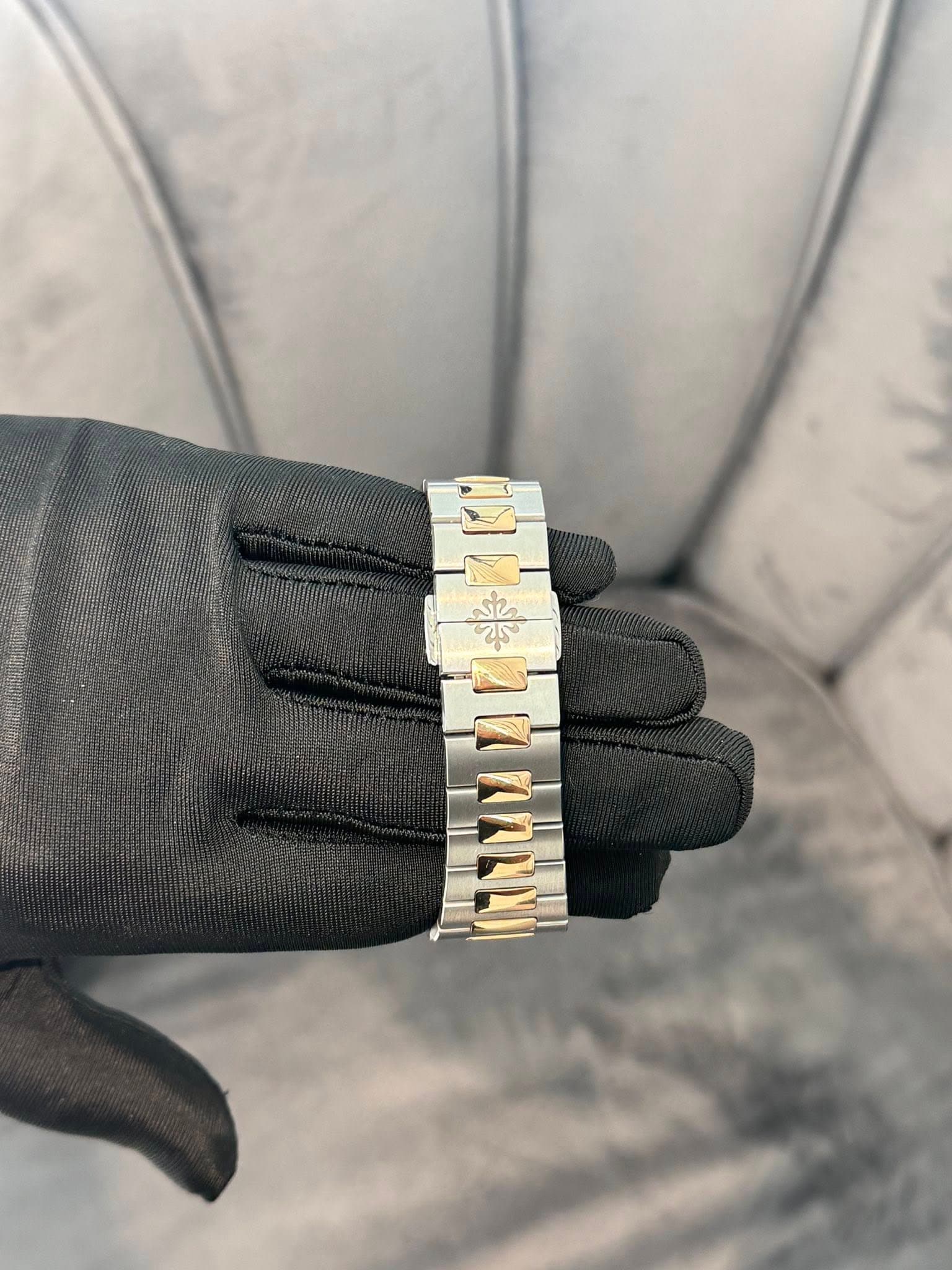 May be an image of jewelry and wrist watch