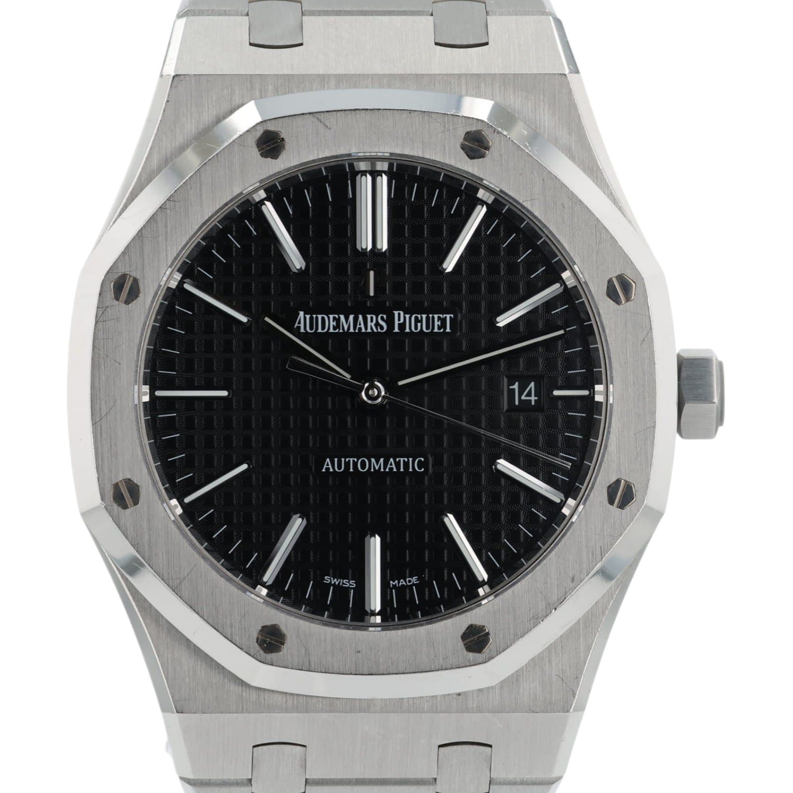 May be an image of wrist watch and text that says '主新 AUDEMARS PIGUET NE 14 AUTOMATIC SWISS'