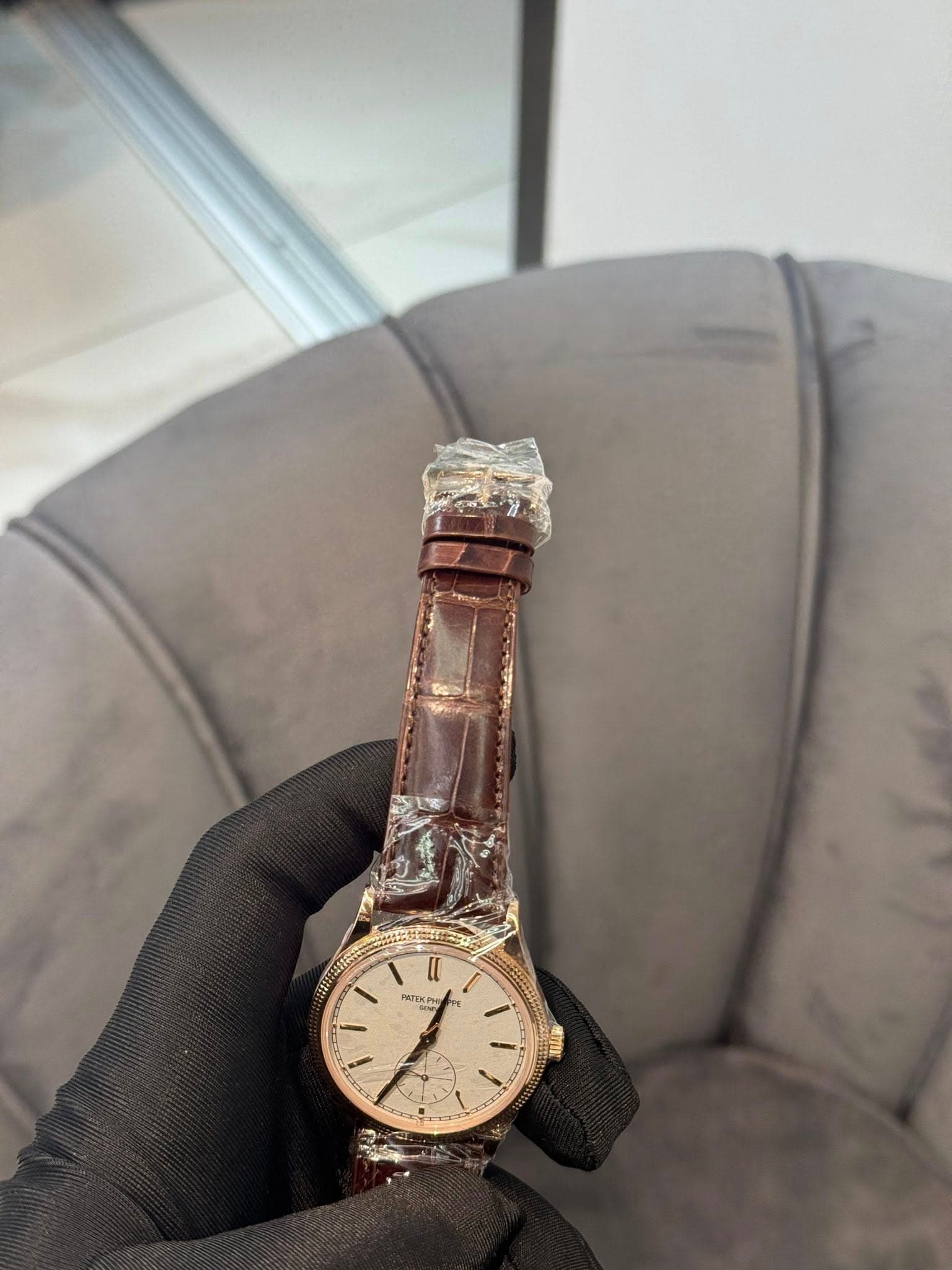 May be an image of wrist watch and text