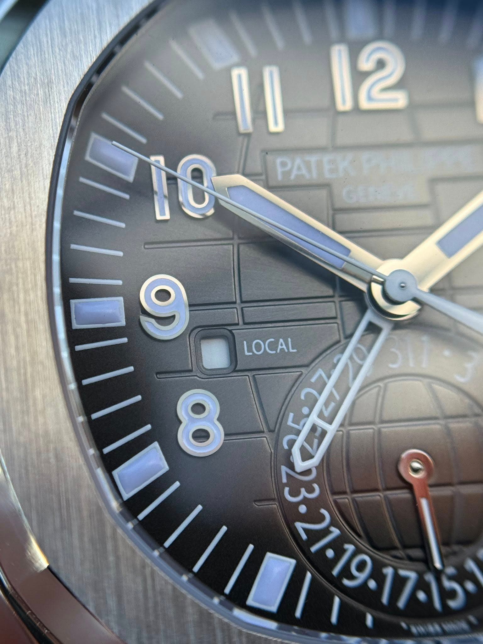 May be an image of wrist watch and text