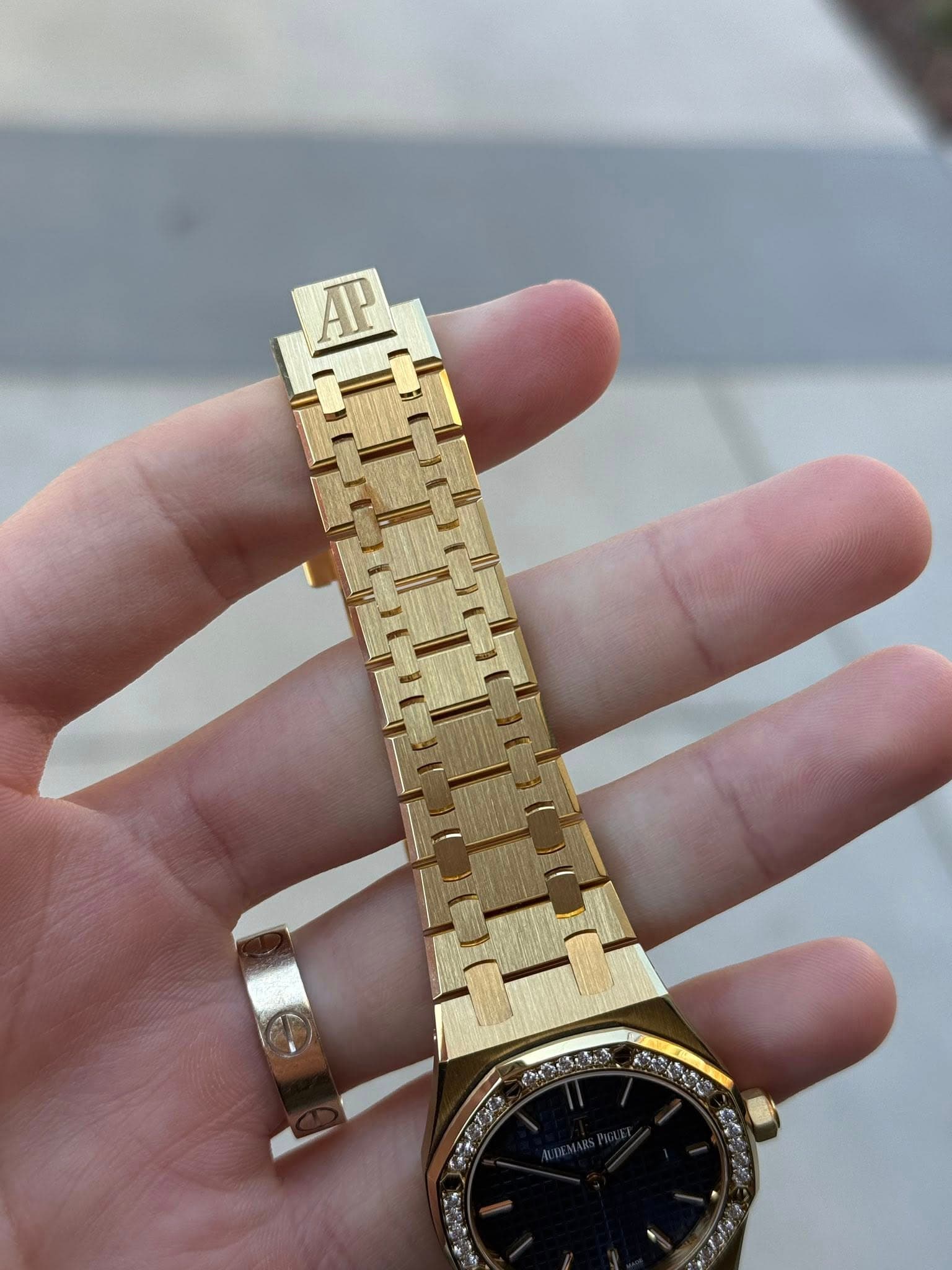 May be an image of wrist watch
