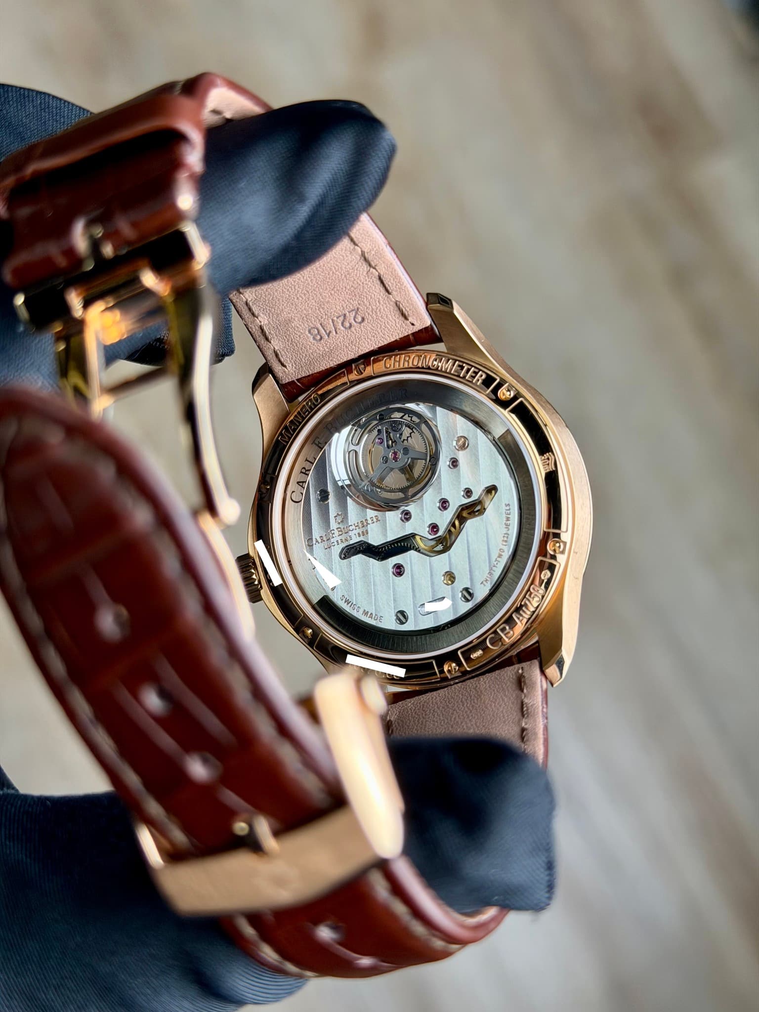 May be an image of wrist watch and text