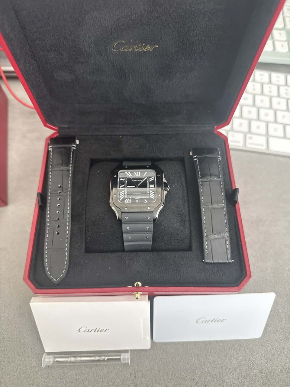 May be an image of digital watch and text that says 'Carser Caur F Cartier Ciutier'