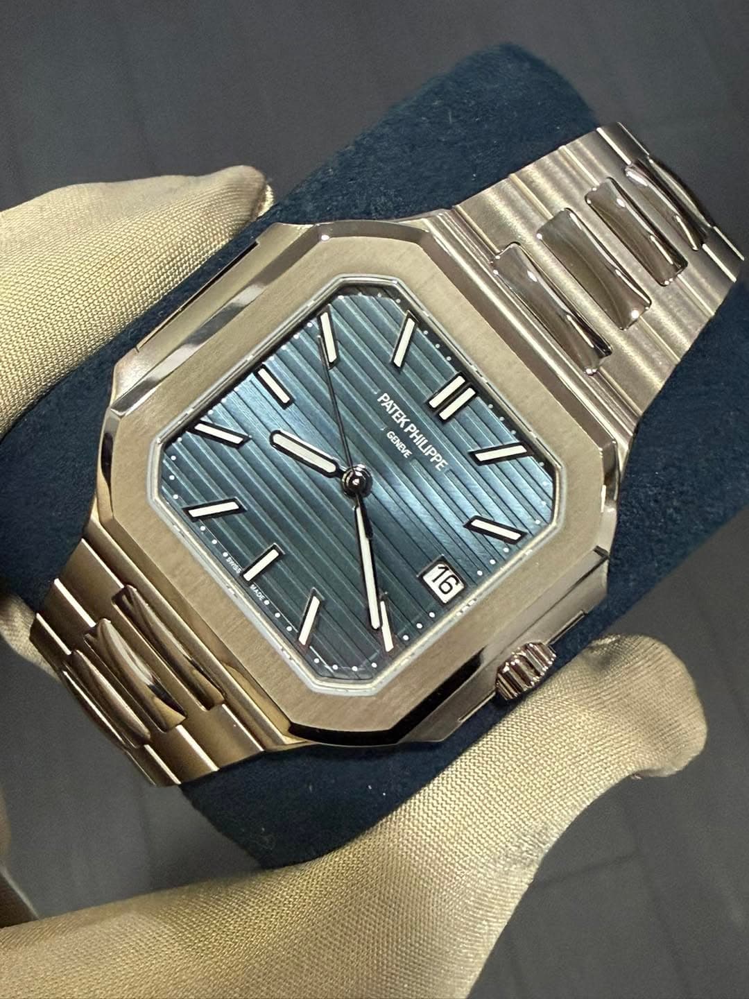 May be an image of wrist watch and text