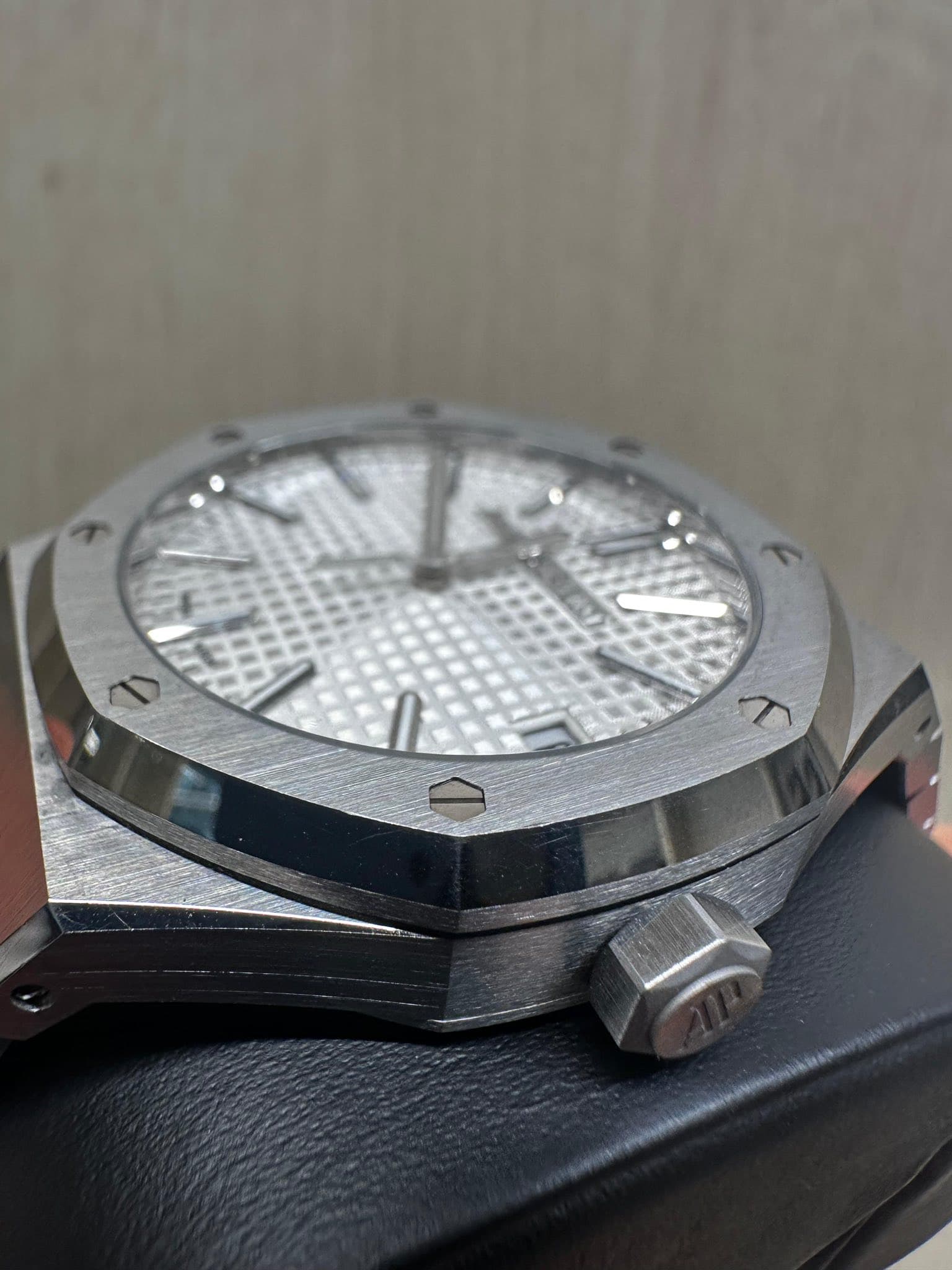 May be an image of wrist watch and text