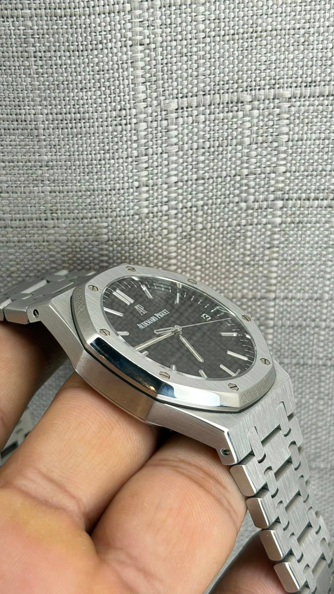 May be an image of wrist watch and text
